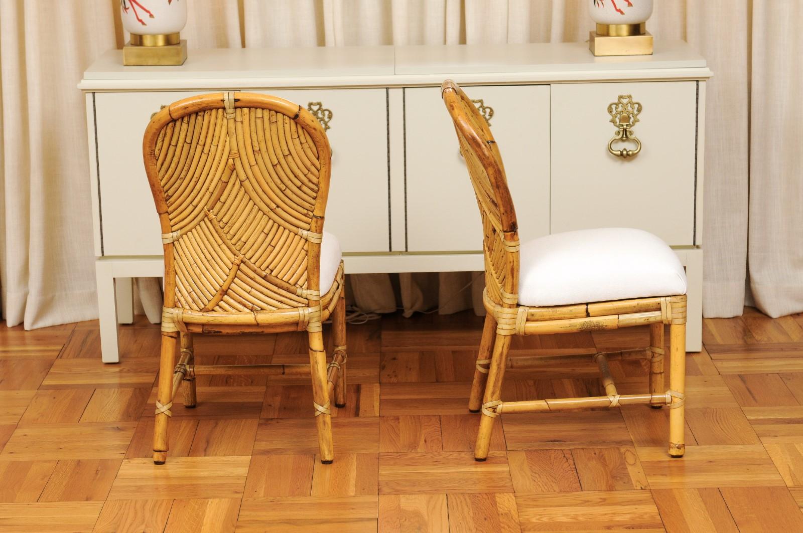Rattan Stellare set restaurato di 8 sedie da bistrot in rattan intarsiato di McGuire, circa 1975 in vendita