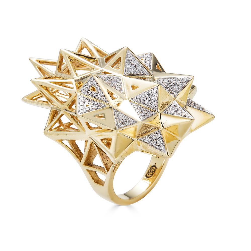 This limited edition, Stellated Star Diamond and 18K Gold Ring is an embodiment of monumental power and strength. This piece's shield-like design mixed with the sacred geometrical form was designed to evoke personal power. This limited edition piece