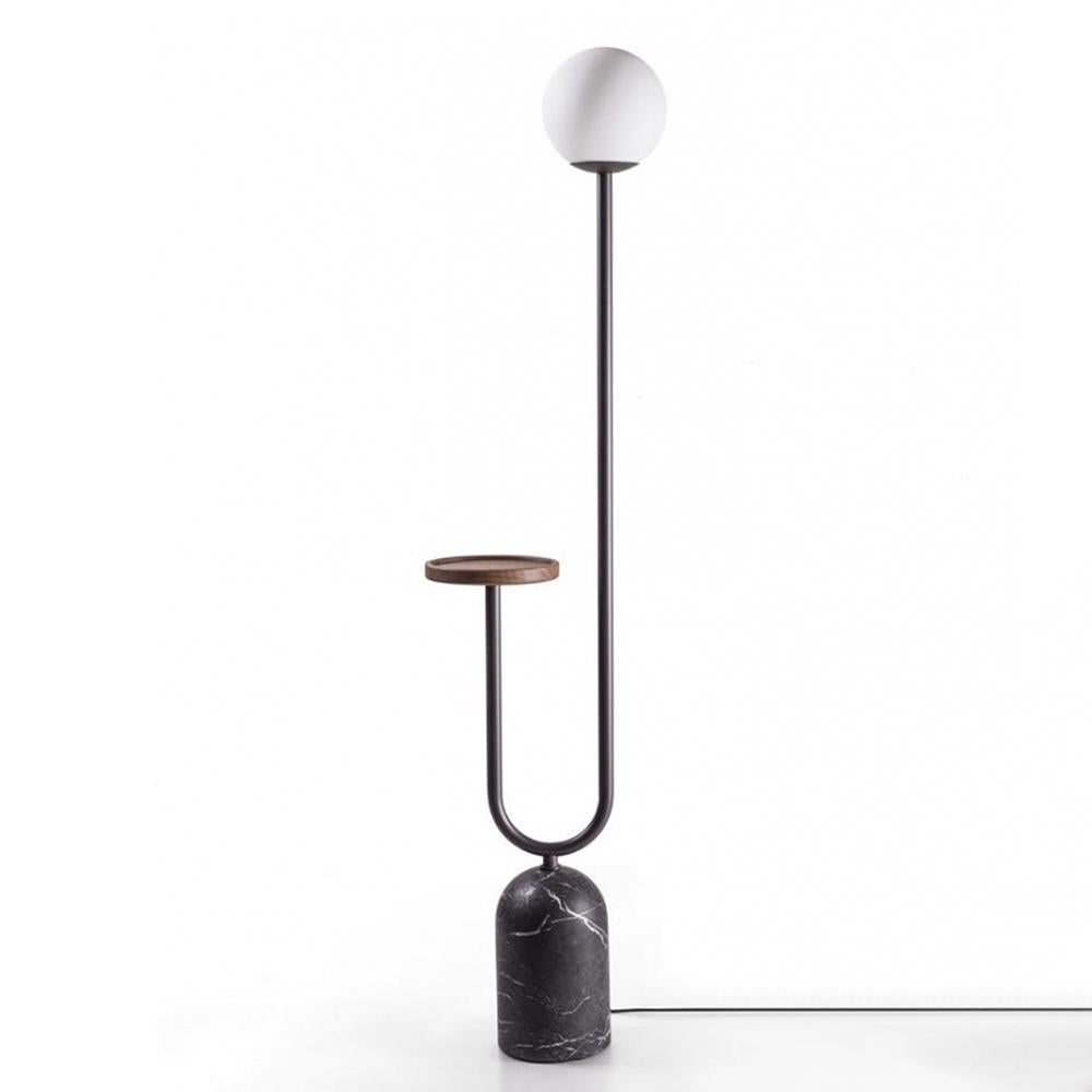 Floor Lamp Stelle with Carnico dark grey marble base 
and with black matte metal rods. Marble base is 20cm 
diameter. With round solid walnut top, 22cm diameter. 
With frosted glass spherical shade, 1 Led bulb, dimmable 
led lighting, bulb not