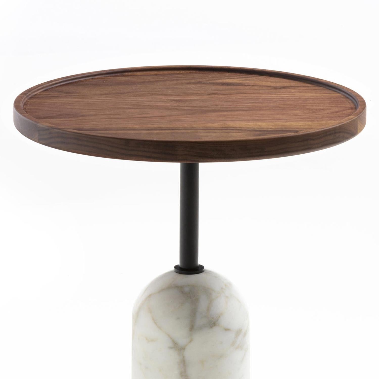 Side table Stelle round with white Carrara marble
base with black matt metal rod.
Base is 14cm diameter. With round solid walnut top.
Also available with Carnico dark grey marble base.
Also available in height 50cm or 60cm.