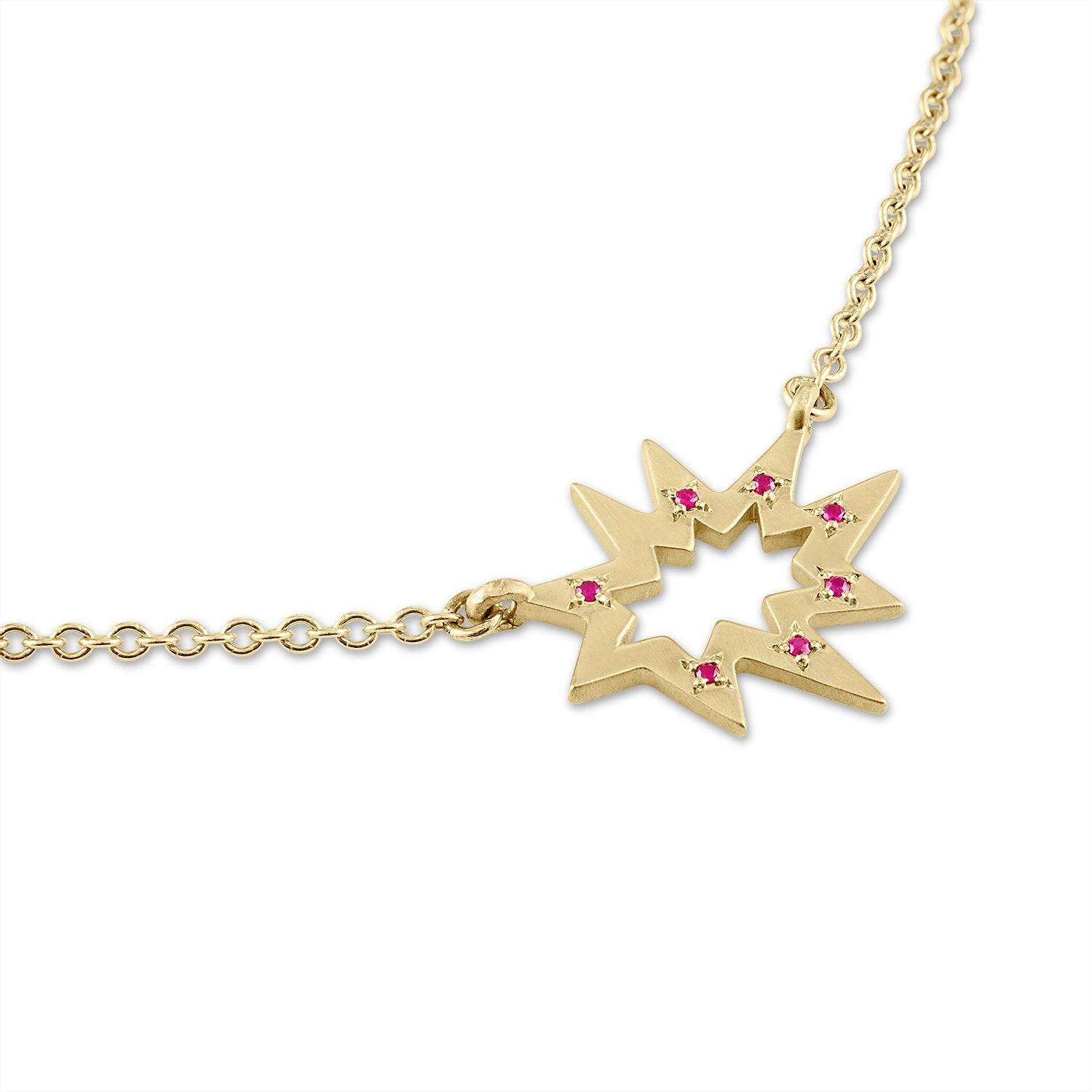 Sunny and bright! Our iconic matte gold Stellina necklace is fresher than ever in its Stellina Nova incarnation. This version features seven small rubies for some elegant razzle dazzle. Hanging on a delicate gold chain, this piece is made to accent