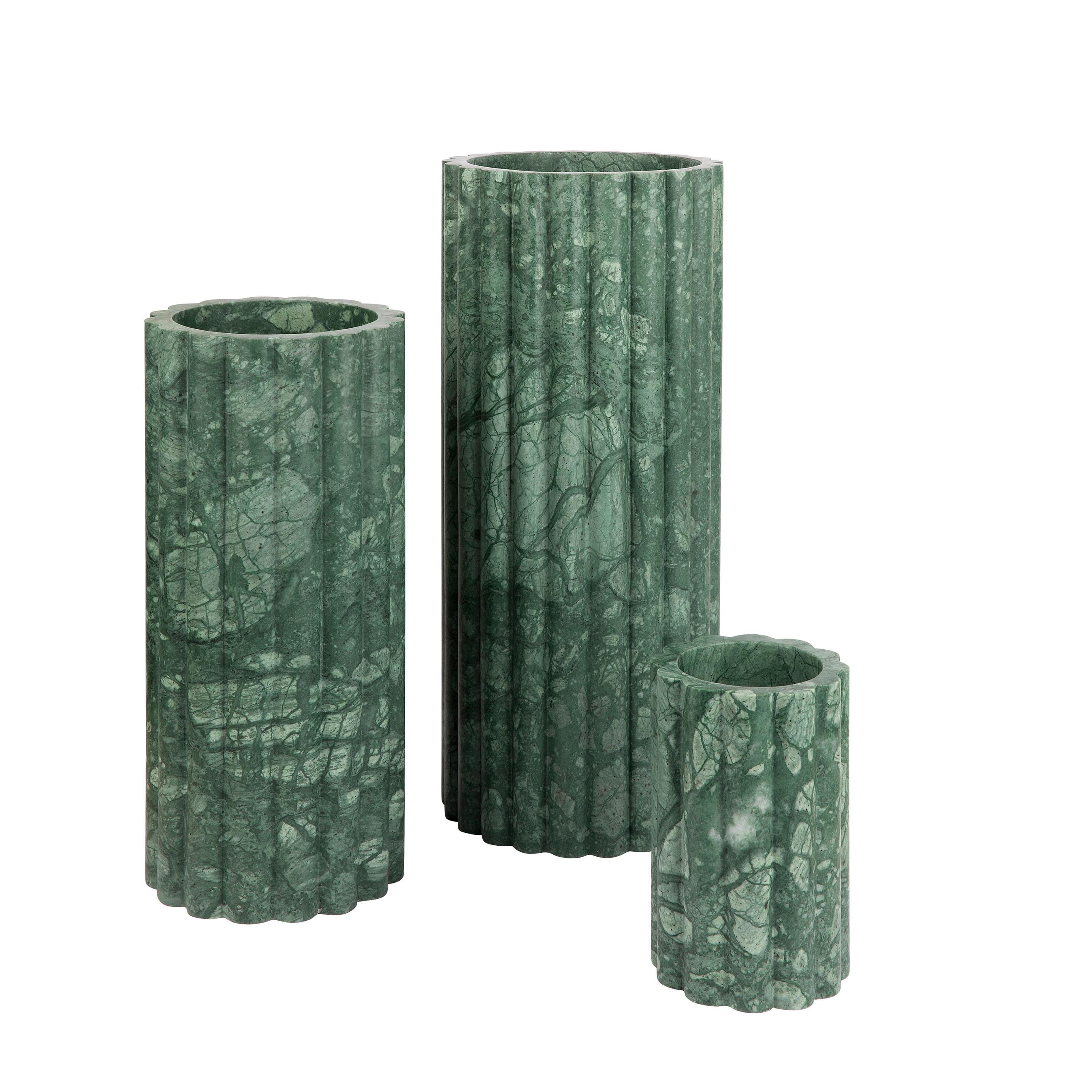 The imposing Vesta collection of vases from Greg Natale draws its inspiration from both the architectural and natural worlds. The power and beauty of the column in Ancient Greek and Roman buildings echoes the delicate yet robust stems and trunks of
