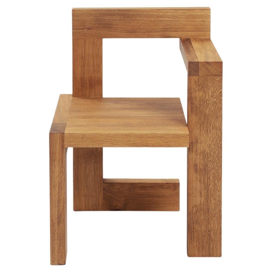 The iconic “Steltman” chair by Gerrit Rietveld, commissioned in both a left and right arm version by sir Steltman, the jewellery-purveyor of the Dutch royal crown with his gallery in The Hague. 

This chair is often referred to as THE most