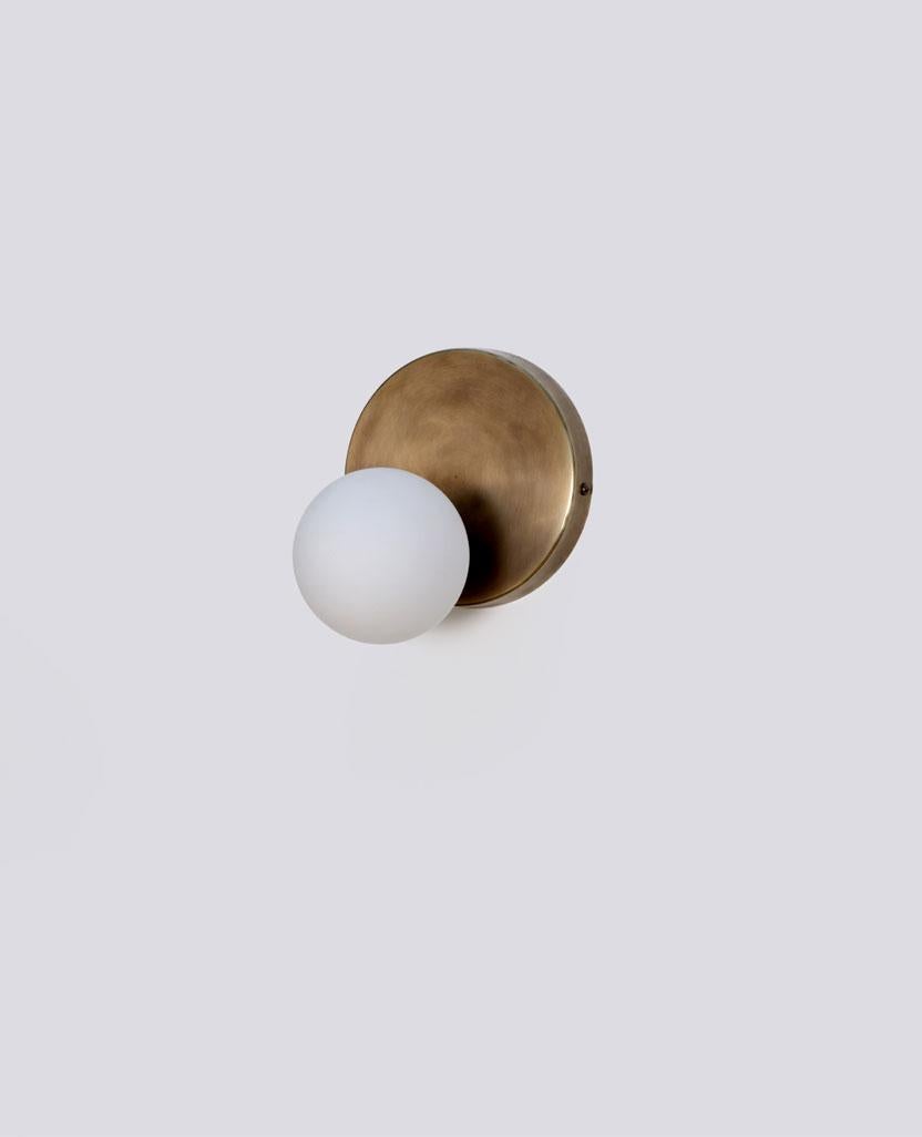 Stem Glass Globe Small Wall Sconce by Lamp Shaper
Dimensions: D 15.5 x W 15.5 x H 18 cm.
Materials: Brass and glass.

Different finishes available: raw brass, aged brass, burnt brass and brushed brass Please contact us.

All our lamps can be wired