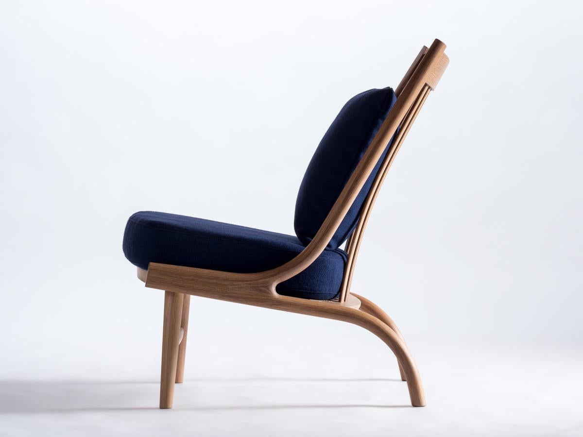 Featuring solid steam-bent hardwood and classic woven fabrics, the Stem lounge has appealing organic curves that flow into one another, cradling the user. The use of bent-wood components allows for a lighter profile that is incredibly sturdy and