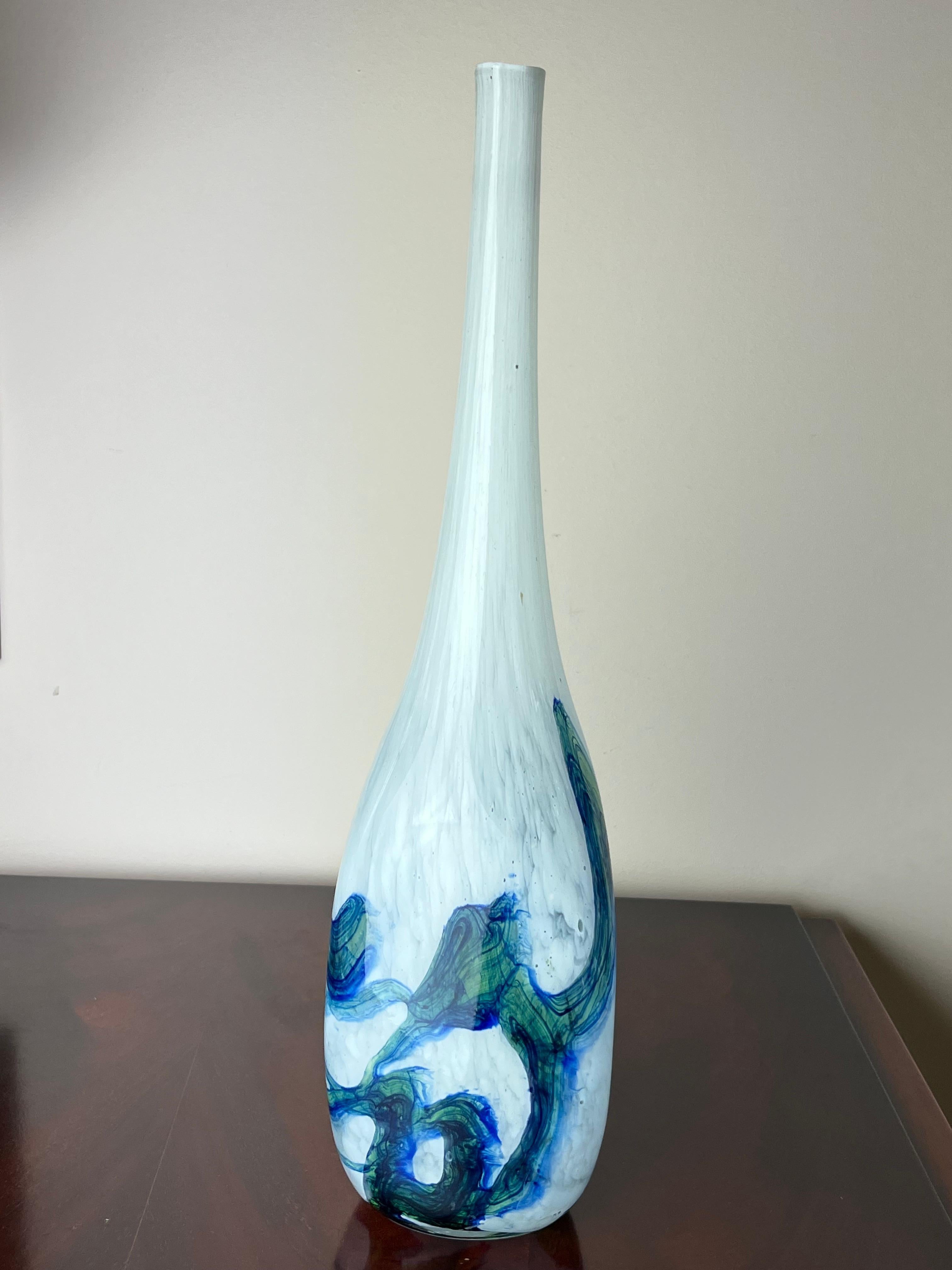 Stem vase in polychrome Murano glass, Italy, 1960s
Intact, found in a noble apartment.
In the descriptive photographs you will be able to notice the air bubbles inside the glass. This attests to the craftsmanship, typical of the best production of