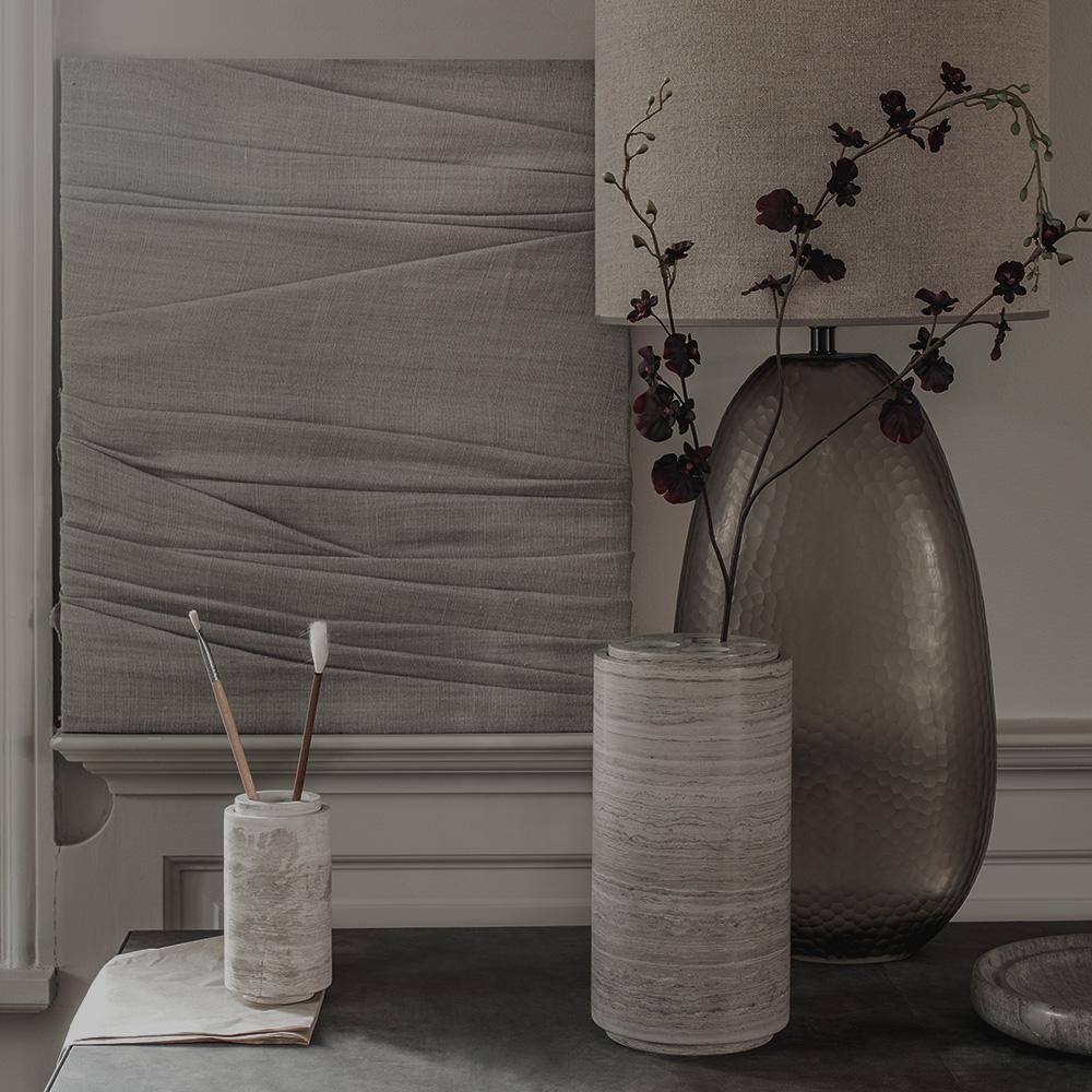 STEM vase large in the color Chalk Grey is a beautiful marble vase and has an insert with four holes in the top, which is removable. The STEM vases are ideal for the current trend to showcase a few dried flowers. The marble may absorb and transport