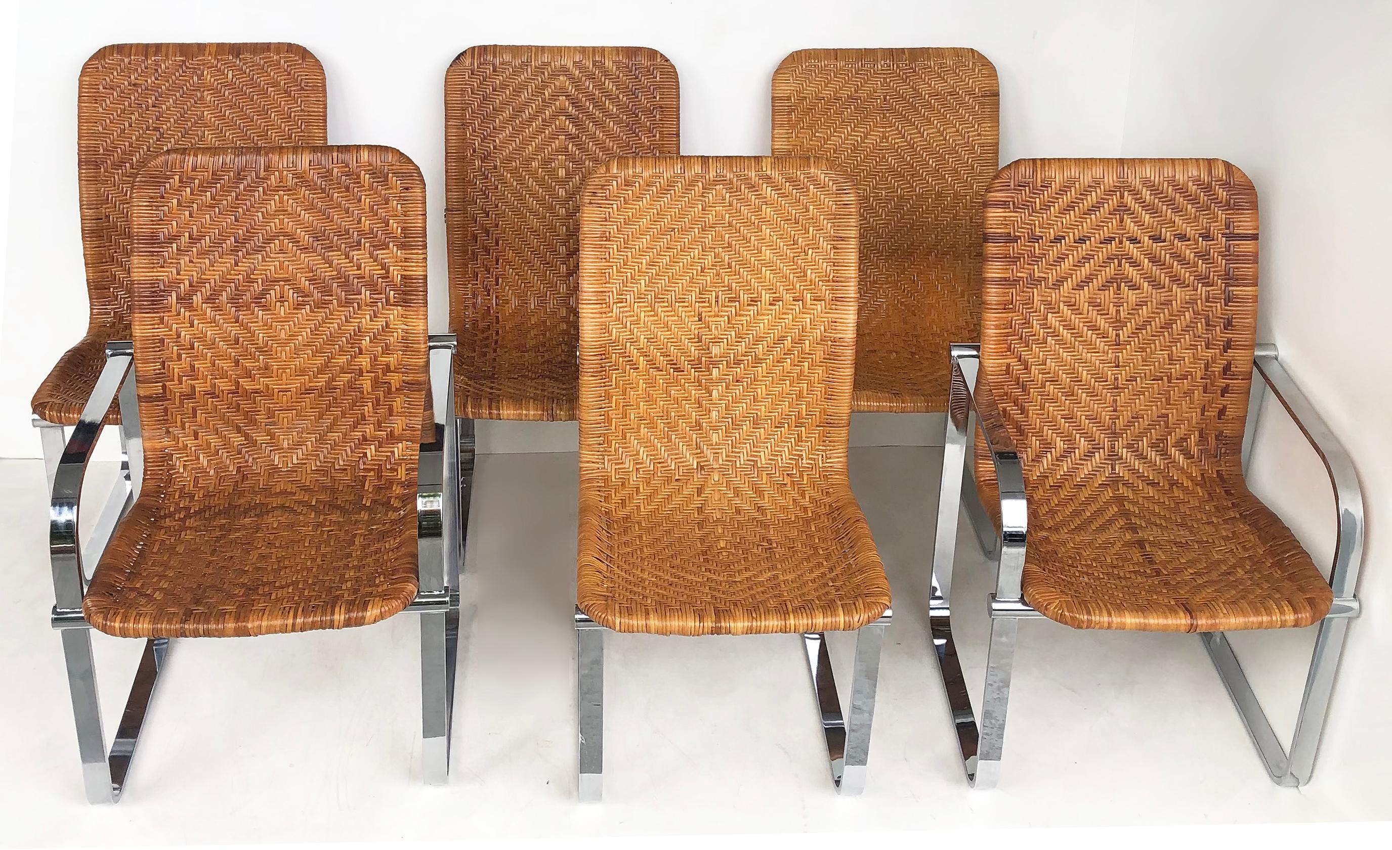 Stendig stainless steel & rattan dining chairs, Set of 6, 1970s

Offered for sale is a set of six mid-century modern stainless steel and woven rattan dining chairs including two armchairs and four side chairs. This elegant set of chairs was