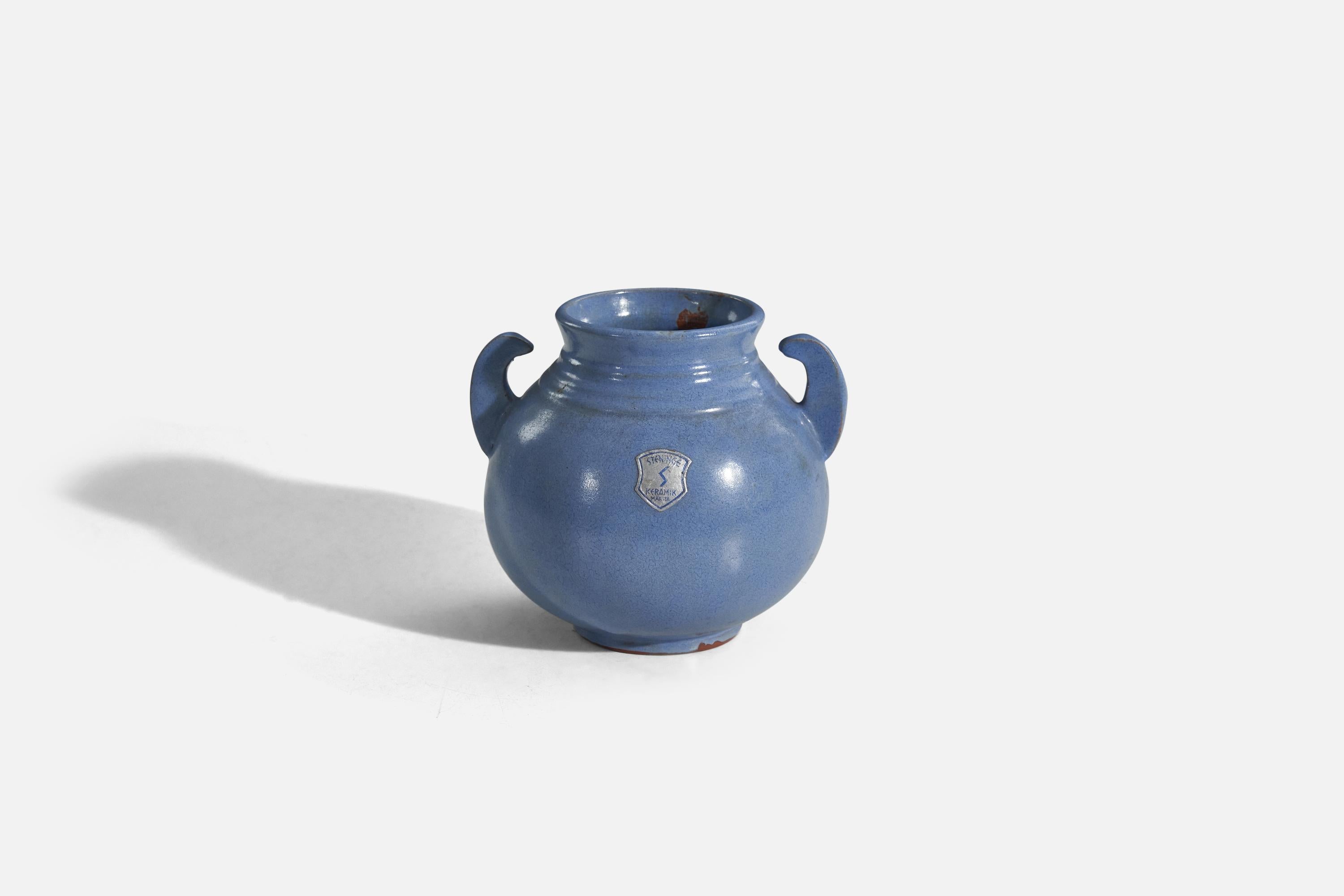 A blue, glazed earthenware vase designed and produced by Steninge Keramik AB, Märsta, Sweden, c. 1970s.
   