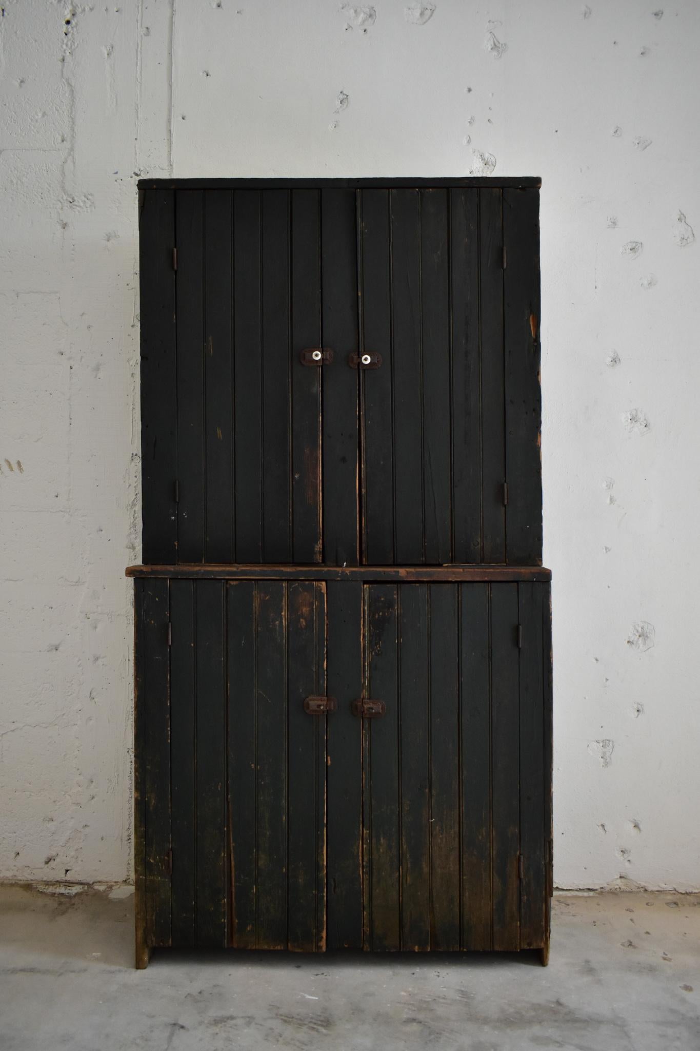 Painted pine step back cupboard, 19th century. 

Three open shelves above a cabinet with two doors than when opened reveal shelving.  

Wear consistant with age 

