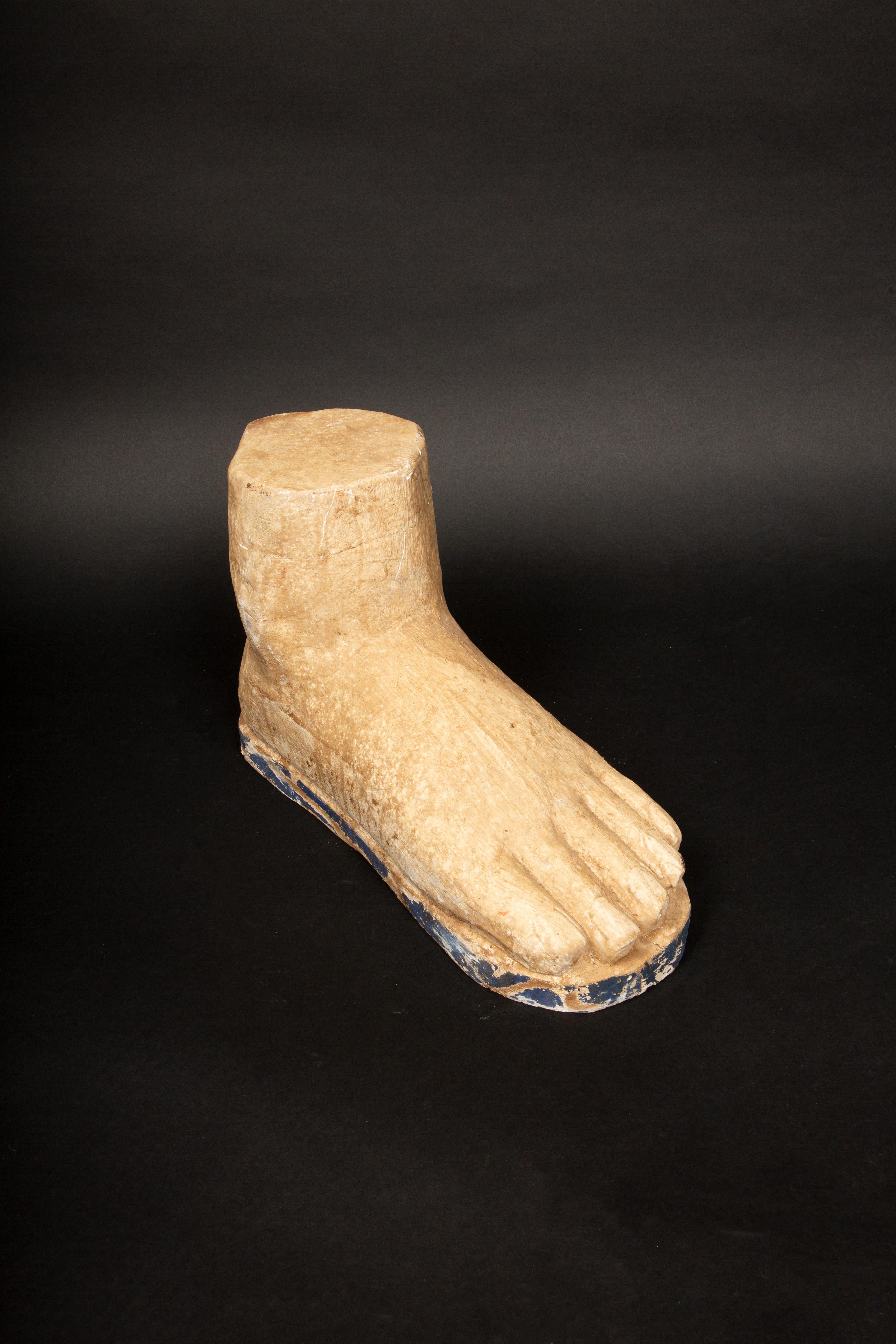 Step Back in Time: A Large Carved Wooden Foot with Character- 16