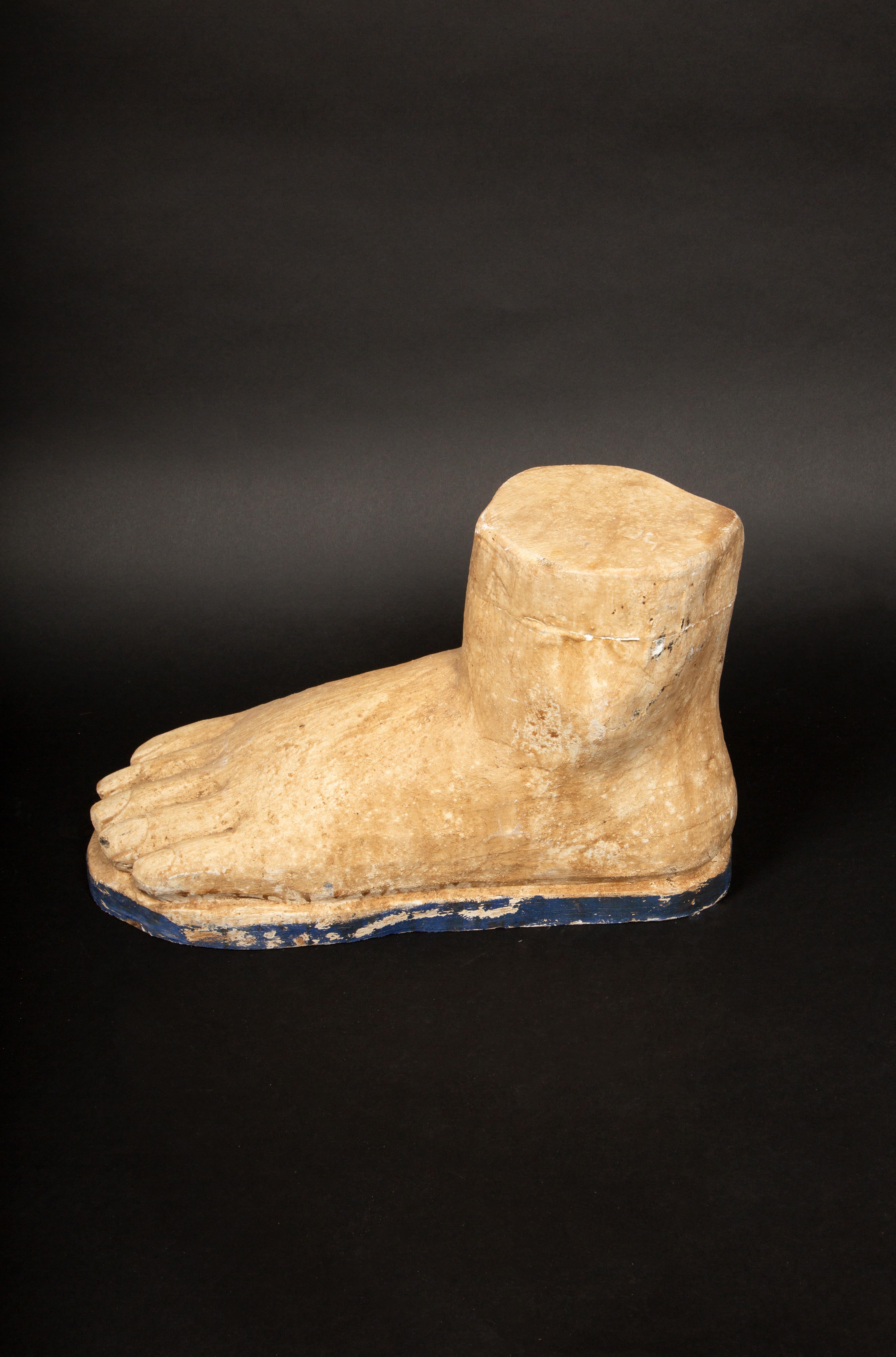 Step Back in Time: A Large Carved Wooden Foot with Character- 16