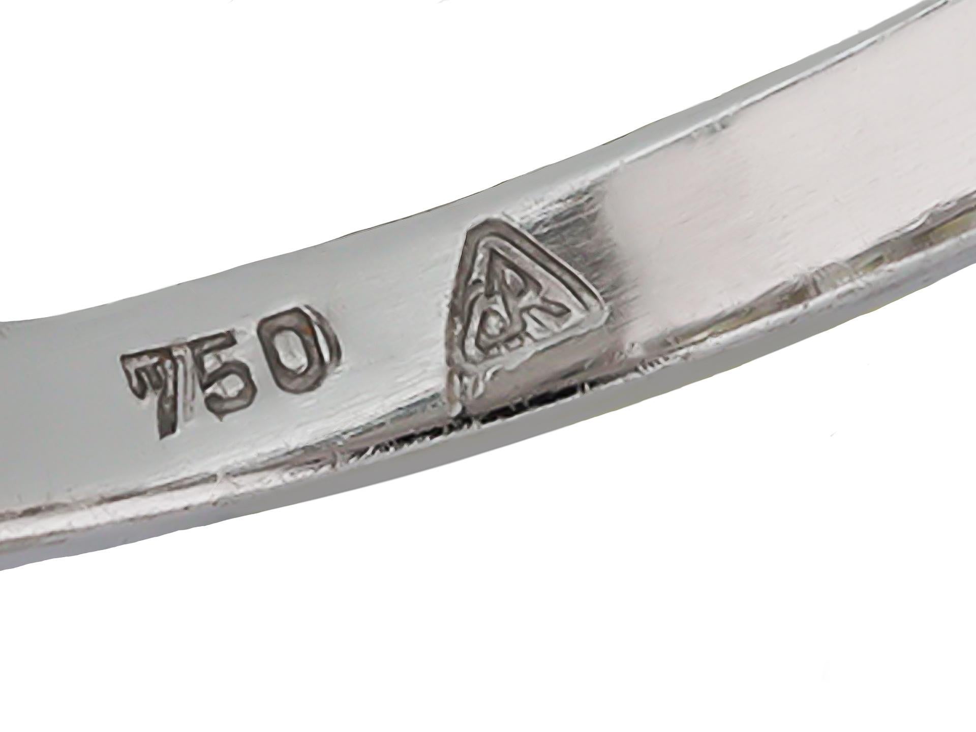 Step-cut diamond three stone ring, circa 1950. In Good Condition For Sale In London, GB