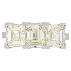 Step-cut diamond three stone ring, circa 1950.