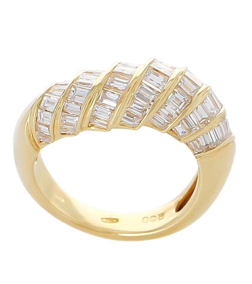 A step-design baguette diamond ring in 18 Karat Yellow Gold. The Diamonds weigh a total of 2 carats. Ring Size US 5.50. The total weight is 5.80 grams. 