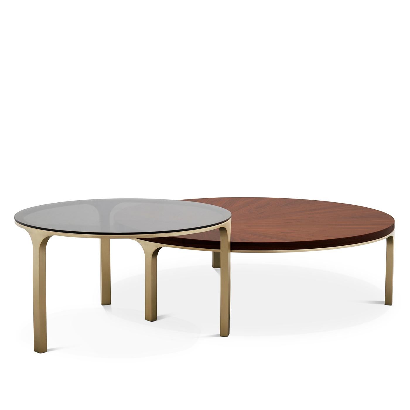 Coffee table step set of 2 with solid brass base 
In brushed finish. Medium side table is made with
A palisander veneered top and higher side table
Is made with a bronzed tempered glass top.