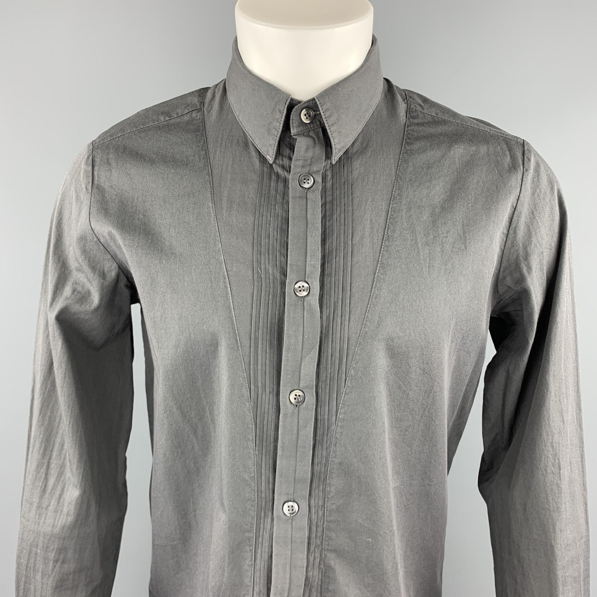STEPHAN SCHNEIDER long sleeve shirt comes in a dark gray cotton with a front pleat featuring a button up style and a pointed collar. Made in Belgium.

Excellent Pre-Owned Condition.
Marked: 5

Measurements:

Shoulder: 17.5 in. 
Chest: 41 in.