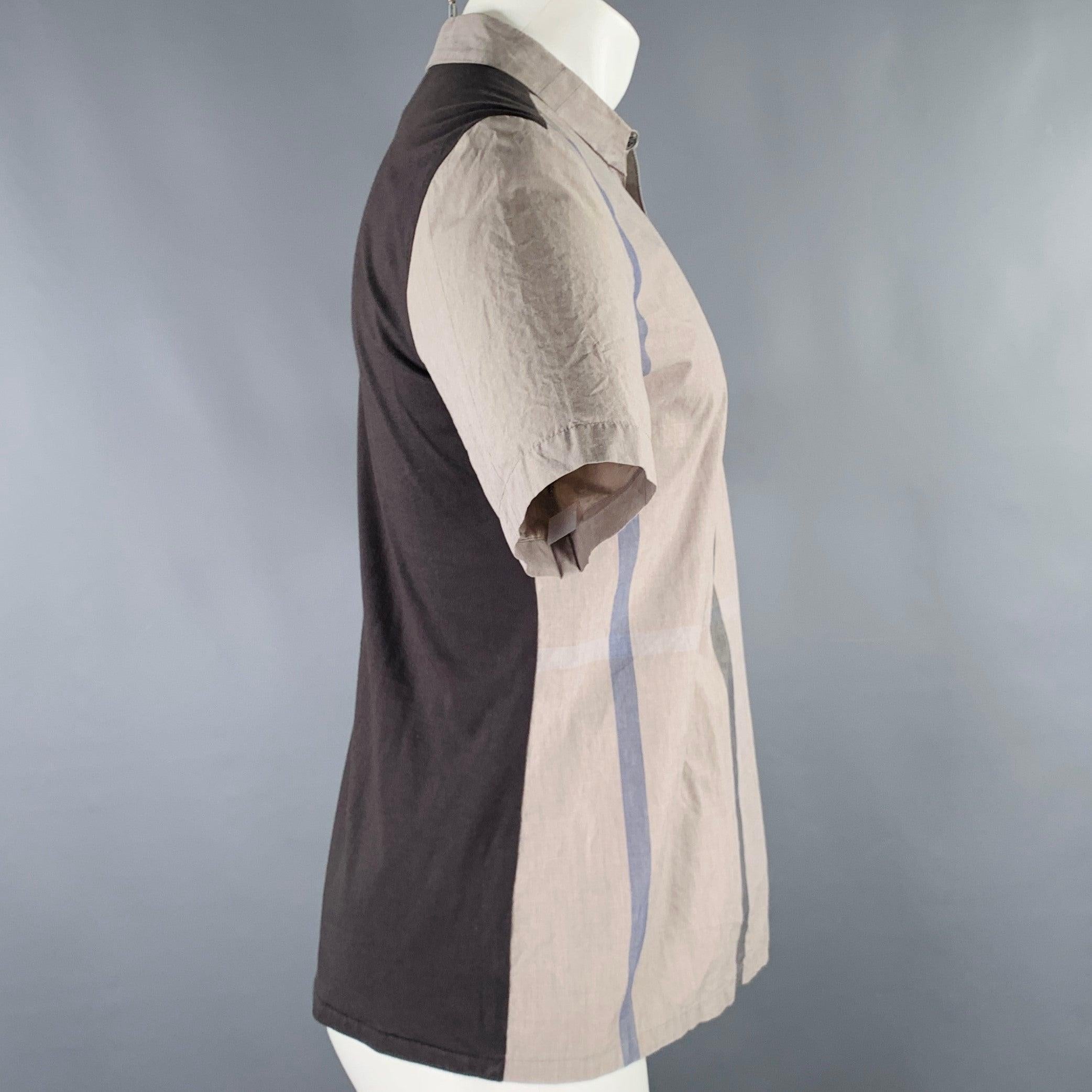 STEPHAN SCHNEIDER short sleeve shirt
in a
grey and taupe cotton fabric featuring a woven front design and knit back, stripe details, and half placket button closure. Made in Belgium.Excellent Pre-Owned Condition. 

Marked:   4 

Measurements: 
