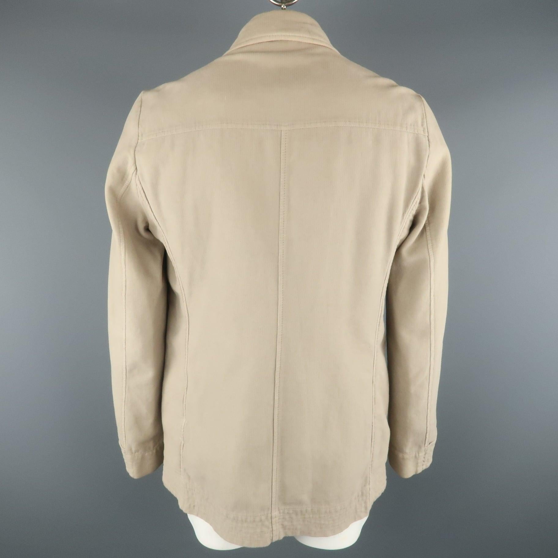 STEPHAN SCHNEIDER Peacoat comes in a khaki tone in a solid cotton material, with a notch lapel, slit pockets, hidden buttons at closure, double breasted. Made in Belgium. Very Good Pre-Owned Condition. 

Marked:   5 

Measurements: 
 
Shoulder: 17.5