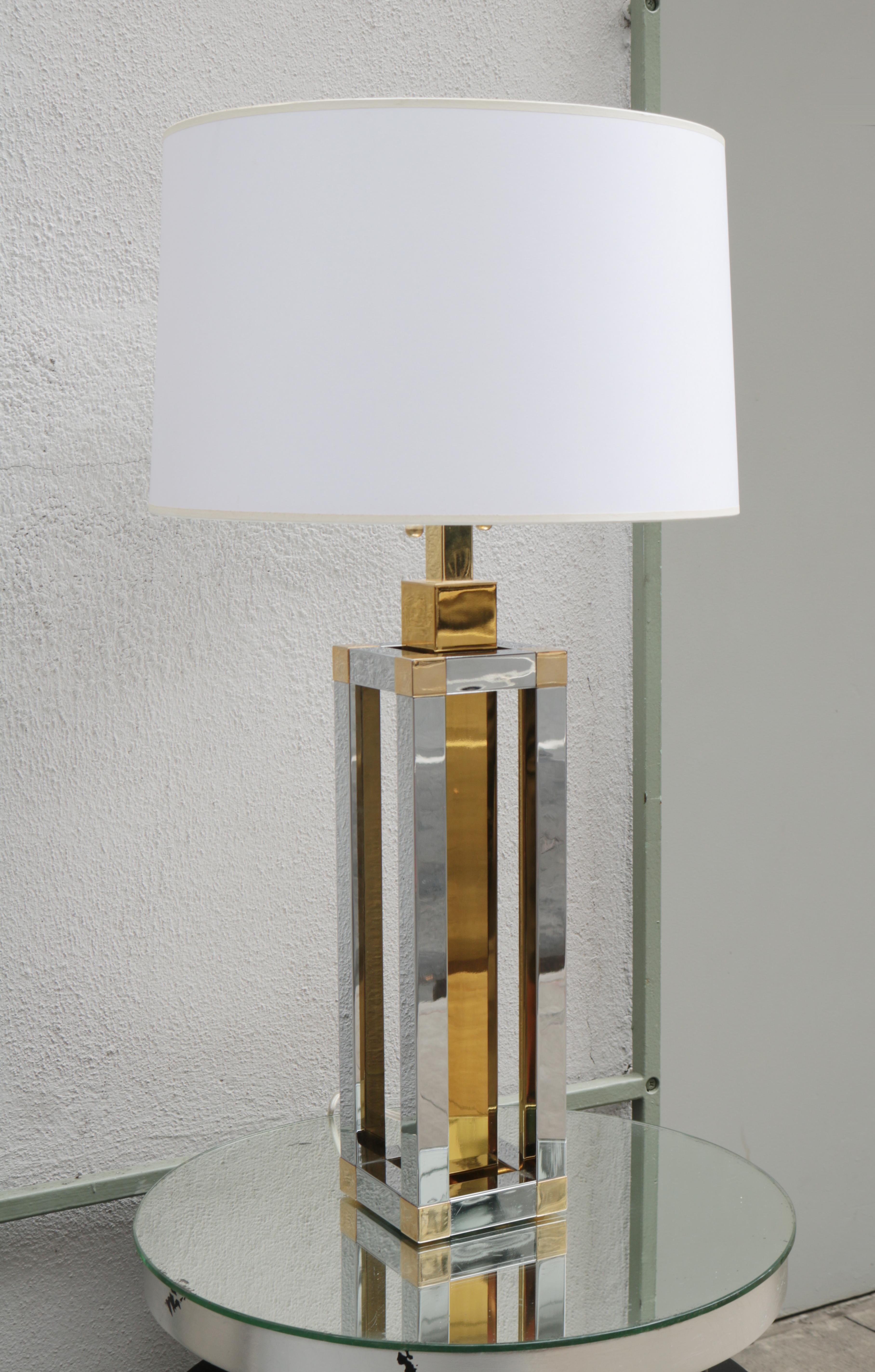 A Modernist table lamp designed by Stephane Davidts.
Geometric form in patinated brass and chrome.