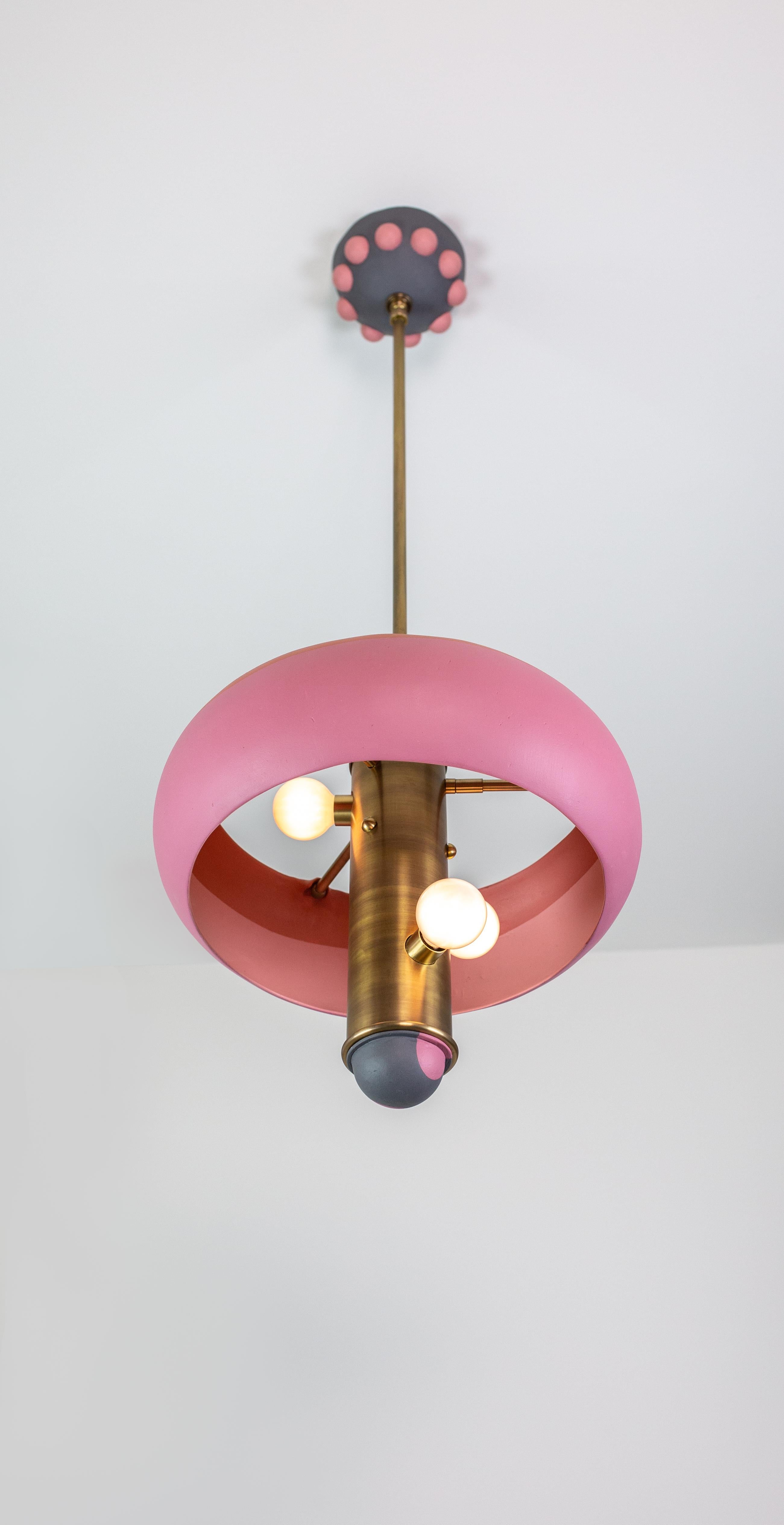 Stephanie is a pendant light, part of the Posse collection, a system designed around the core ideas of collaboration and play.

The pendant is created to give the customer freedom in tailoring their own expression. The design is centered around a