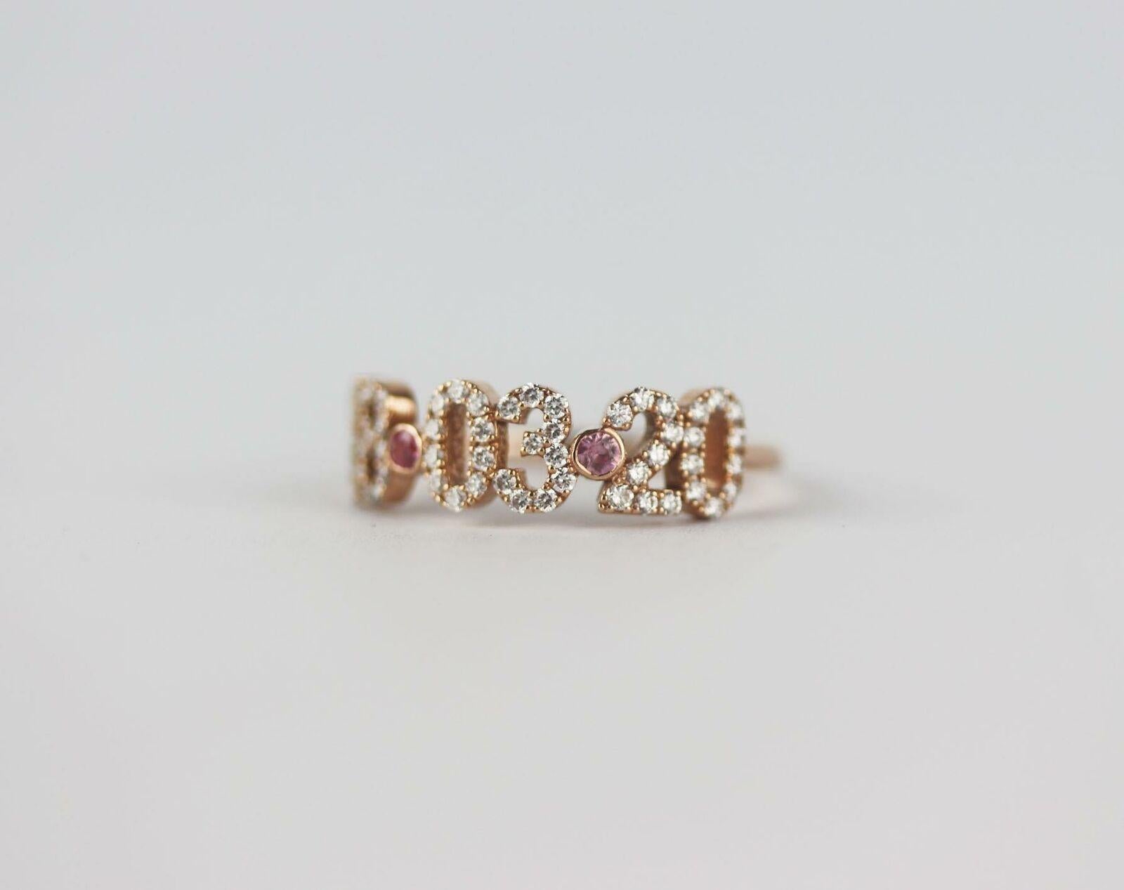 An 14k rose gold pave diamond and tourmaline date ring by Stephanie Gottlieb + Noush Jewelry, this ring comprises of pink tourmaline and round brilliant cut pave diamonds in the formation of the date '18.03.20'.
14K Rose gold, diamonds and pink