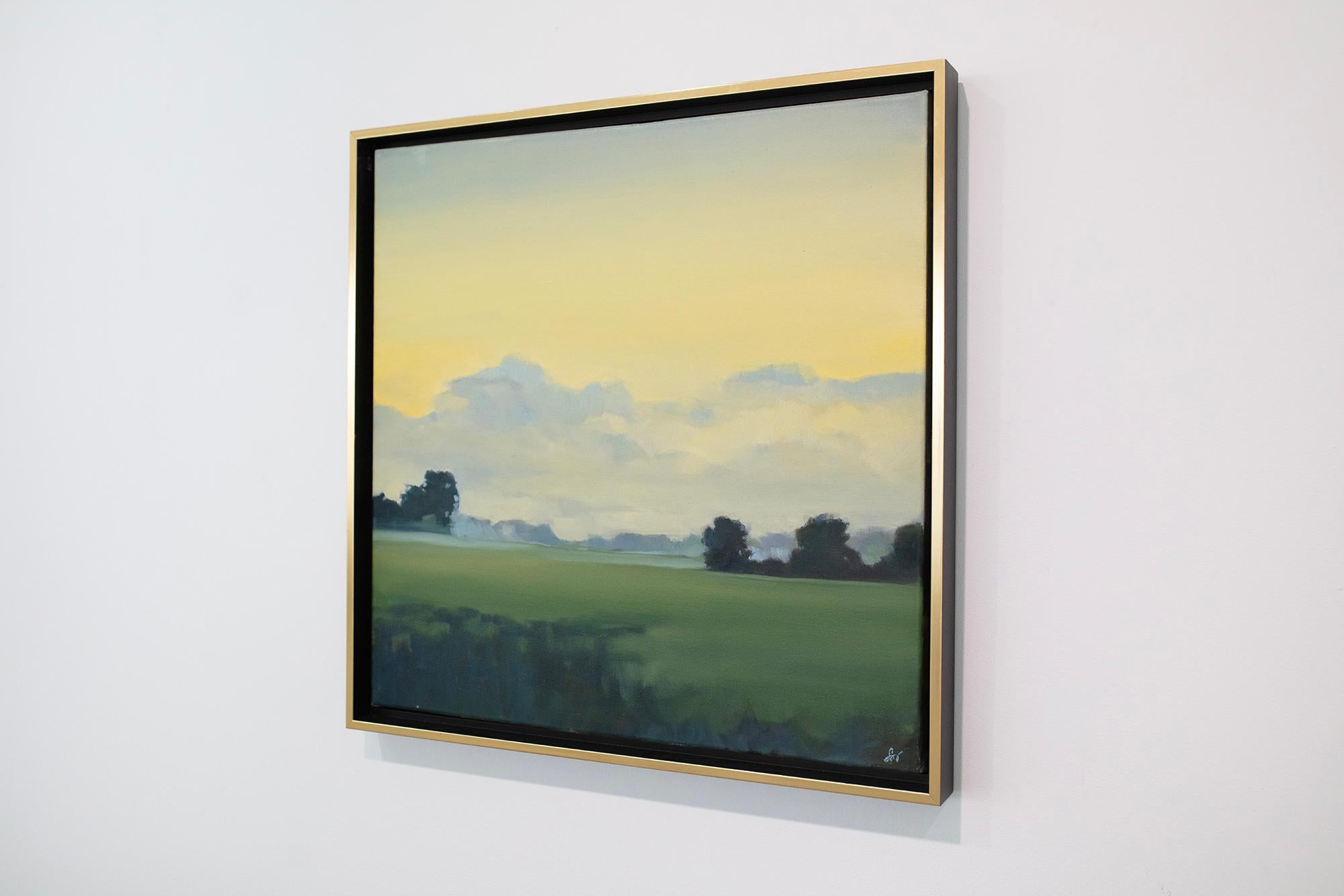 This atmospheric oil painting by Stephanie Johnson, titled Clearing, captures the fleeting moment when dawn or dusk quiets the landscape in a soft hush. A luminous yellow sky gradually transitions into layers of misty blues and greens, suggesting a