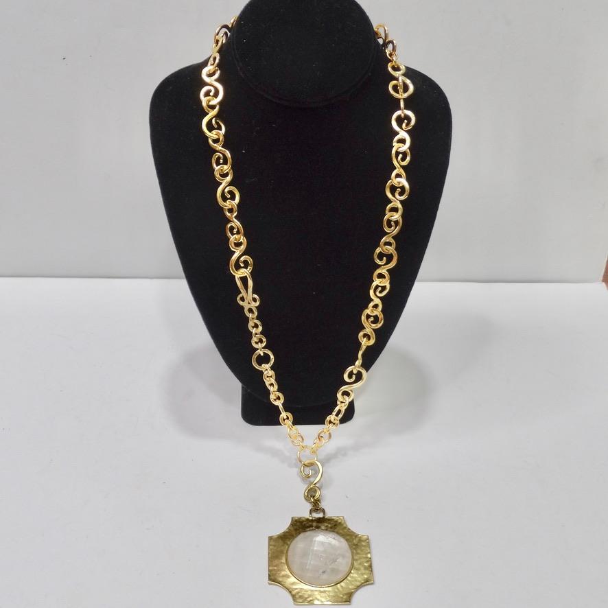 How beautiful is this Stephanie Kantis gold plated pendent necklace?! The perfect statement pendent necklace to add to your collection has arrived! Gold tone swirl motif chain links join together a dangling pendent that features a large white quartz