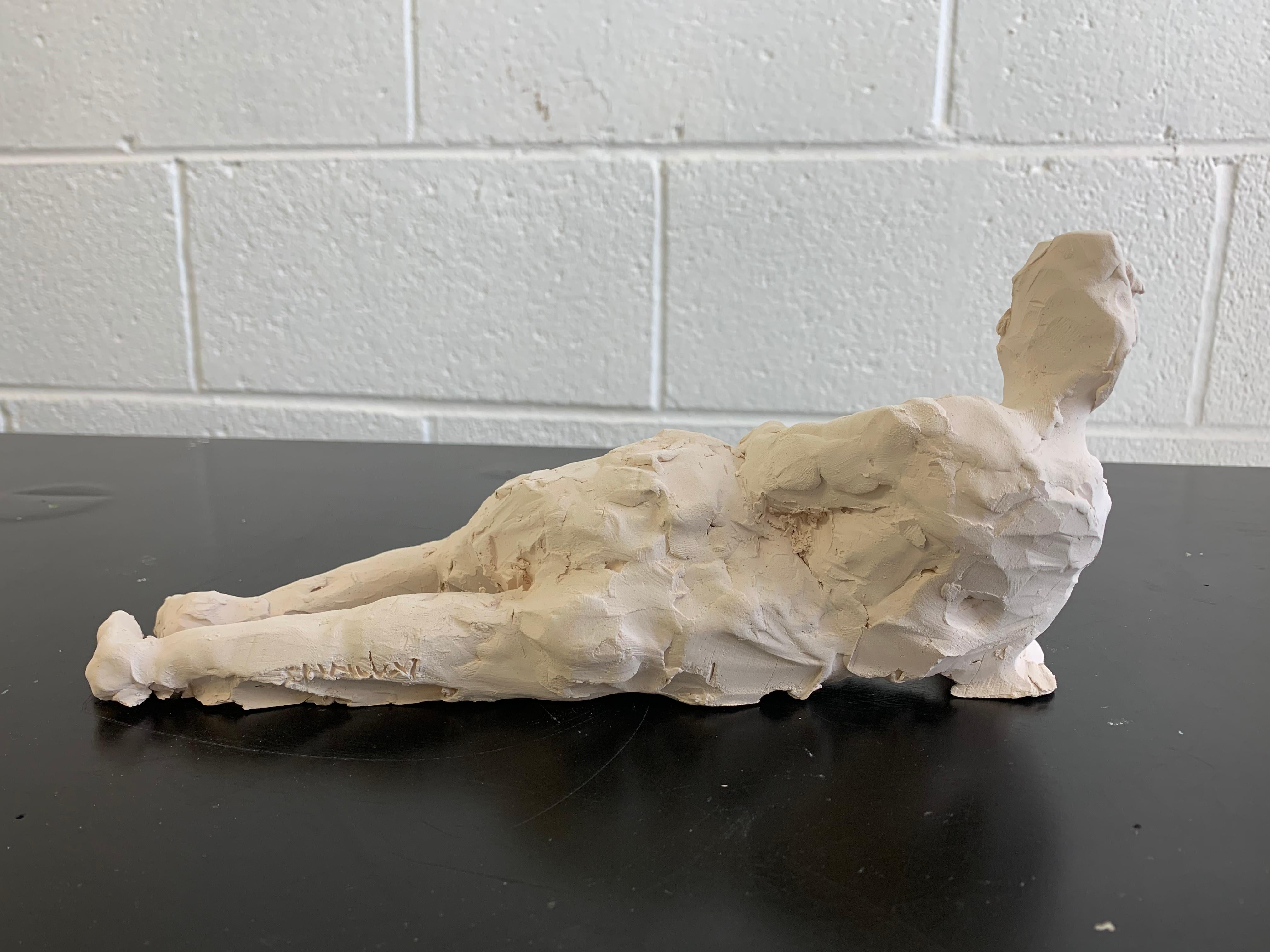 Clay reclining nude sculpture by Stephanie Wheeler.
Abstract style with painterly qualities .
Signed 
Great tabletop piece !