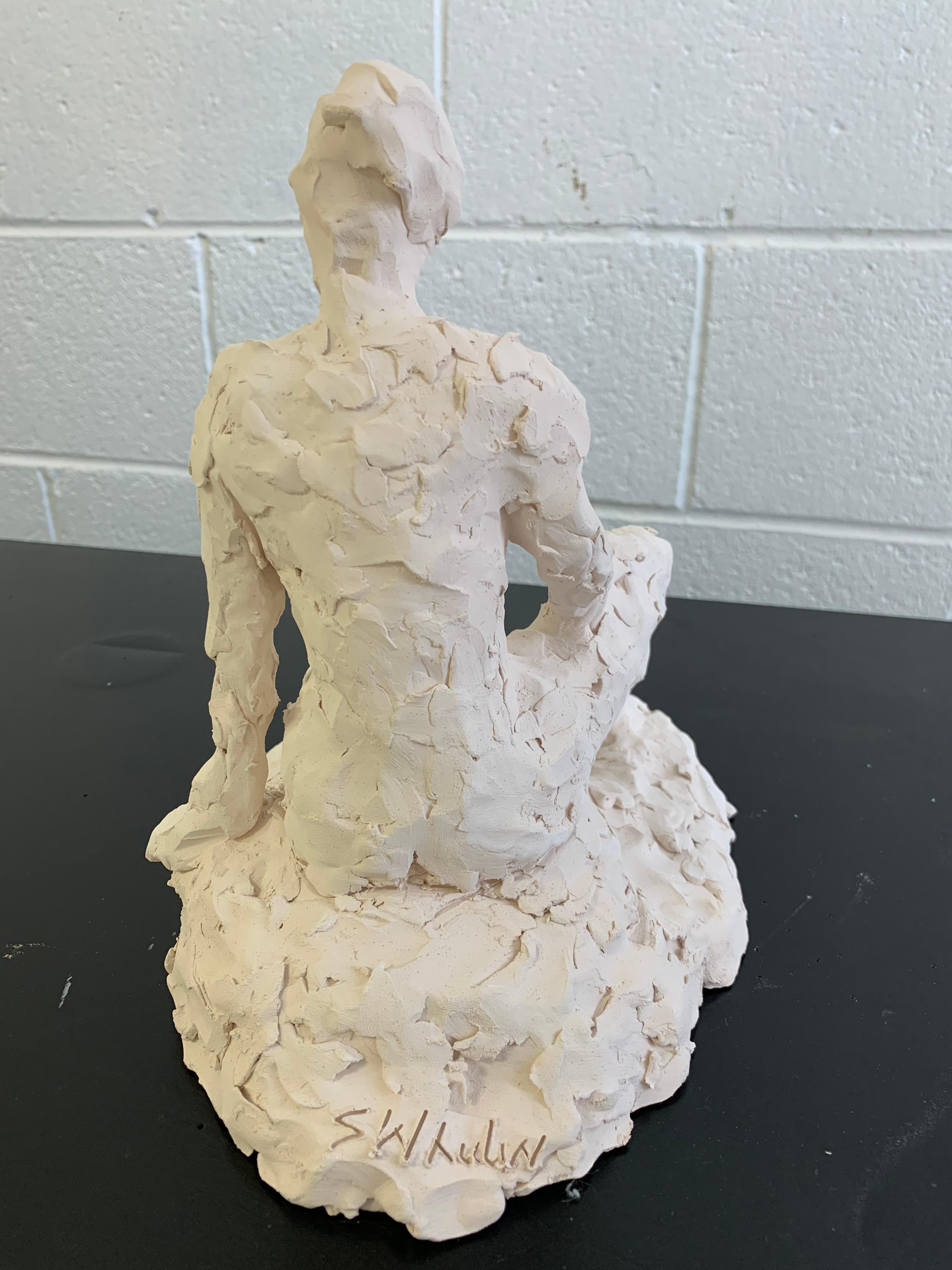 clay woman sculpture