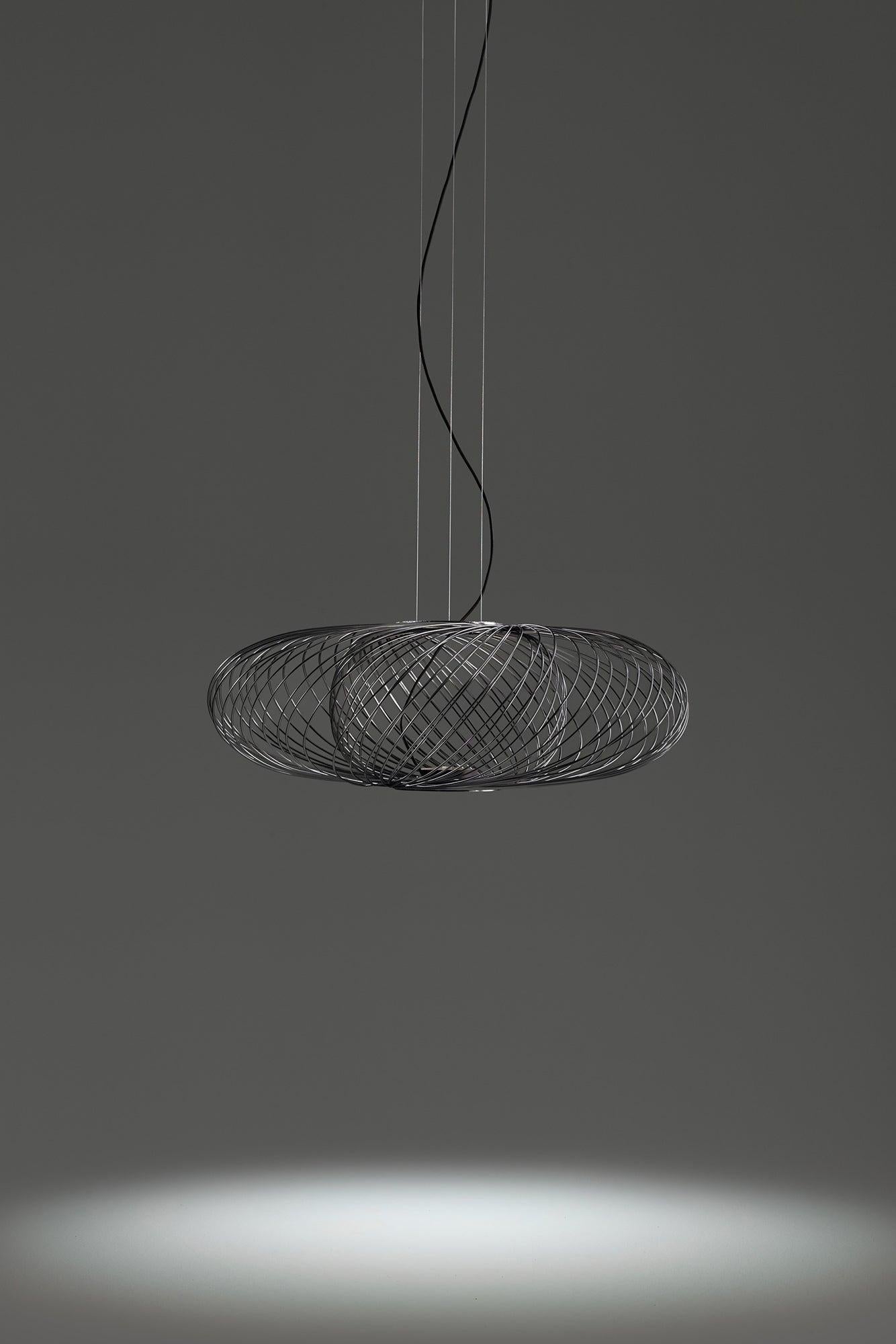 Anwar T 30

Suspension lamp, model Anwar T 30, designed by Stephen Burks in 2013. 
Manufactured by Parachilna. 

Each structure is composed by nearly 100 steel rods welded one by one. It’s an artisanal lamp that reminds traditional wicker baskets.