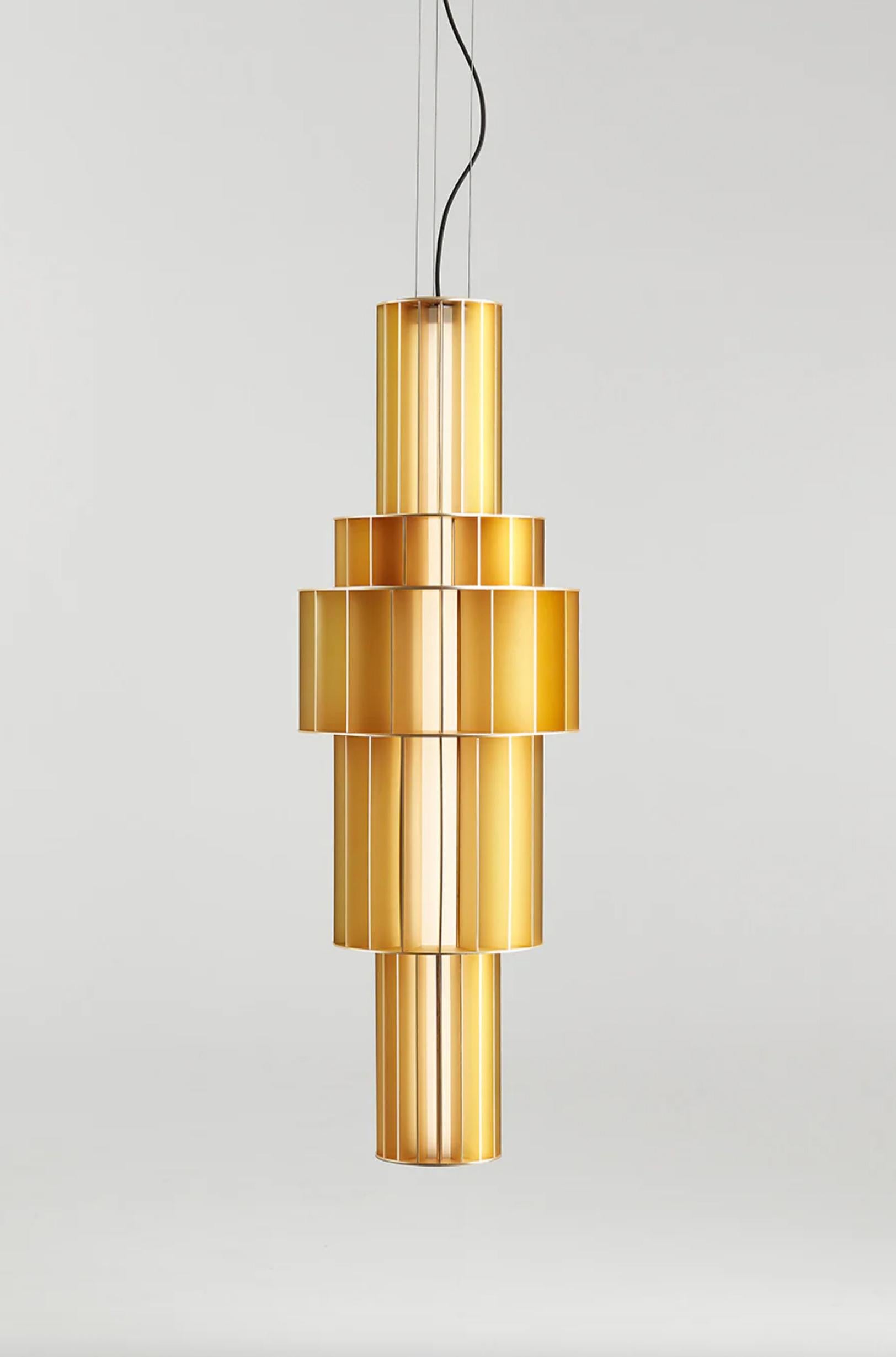 Stephen Burks Babel T GR Lámpara Suspendida Dorada Para Parachilna

Lámpara suspendida construida con estructuras de aluminio de diferentes alturas y diámetros. Las estructuras y los colores pueden combinarse aleatoriamente creando figuras parecidas