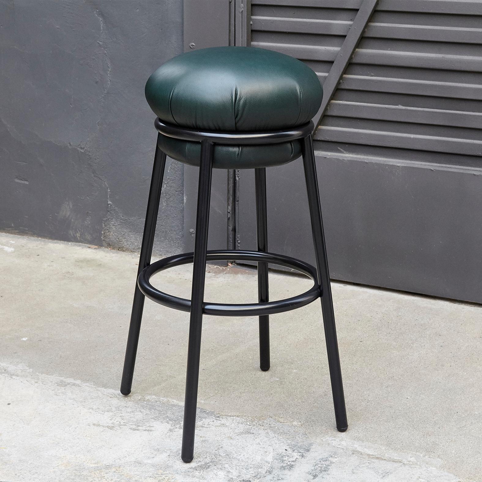 Stool designed by Stephen Burks

Black iron tubular (25mm) structured armchair. Seat upholstered in blue leather with blue structure.

The leather upholstery oozes over the bare iron structure. 

Measure: Ø 36 x H 80 cm

Year: 2018.

In