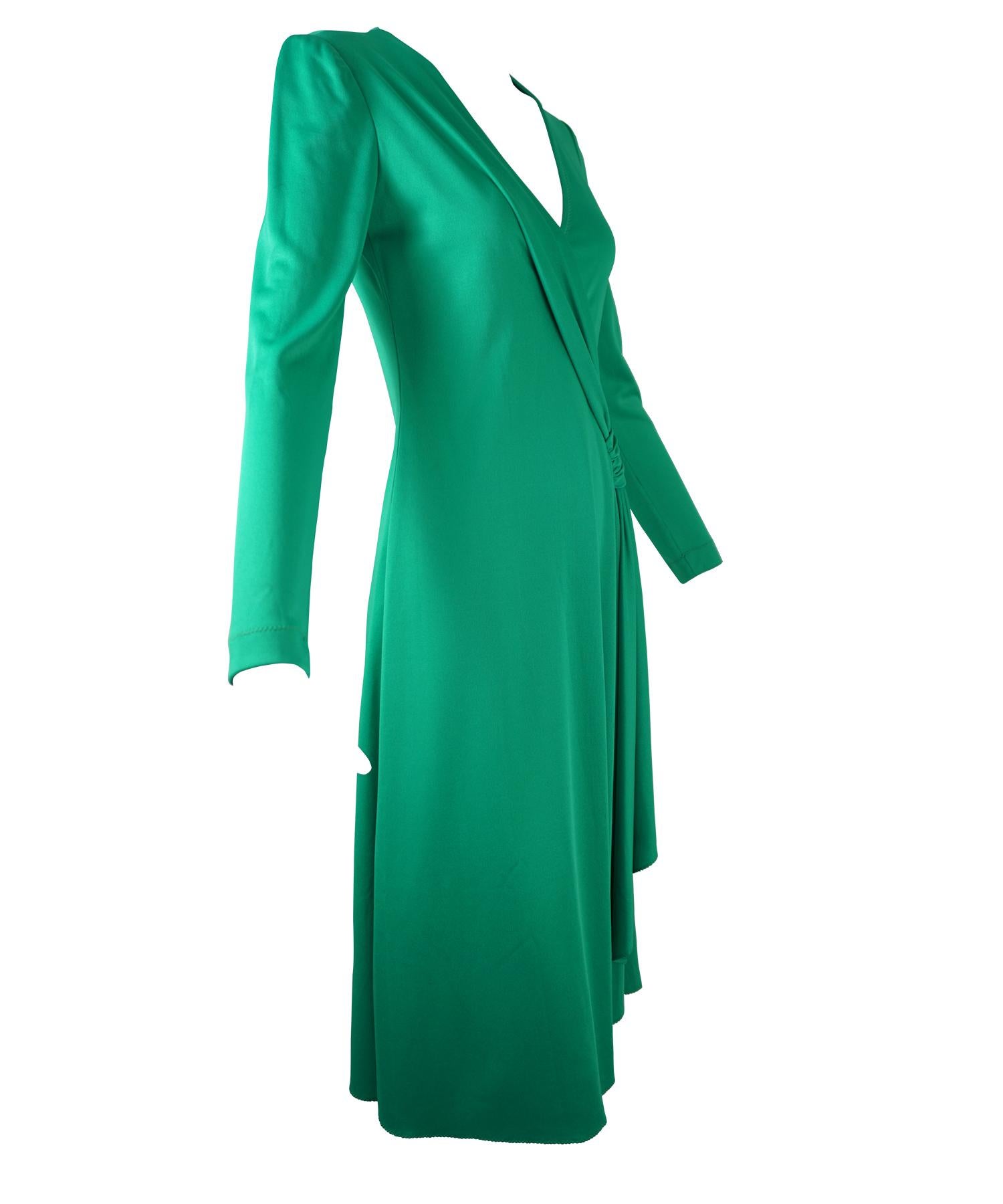 Stephen Burrows bright kelly green rayon matte jersey dress. Vintage 1970's haute disco. Features a deep V neck, ruched gathering sash on left hip above an asymmetrical side opening. Clothing by Stephen Burrows is rare to find on the resale market