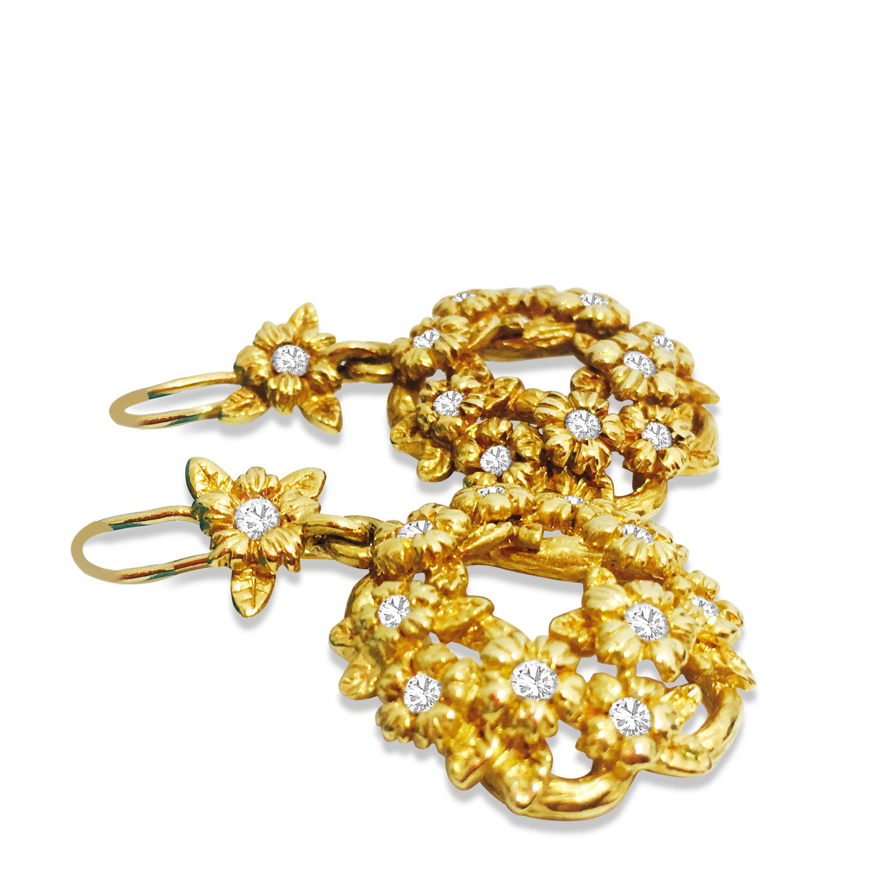 Metal: 18k yellow gold. TCW of Diamonds: 0.70cts.  Clarity: SI. Color: F-G. Round brilliant cut diamonds. 
Brand: Stephen Dweck
Ladies, Yellow gold and diamond earrings. 