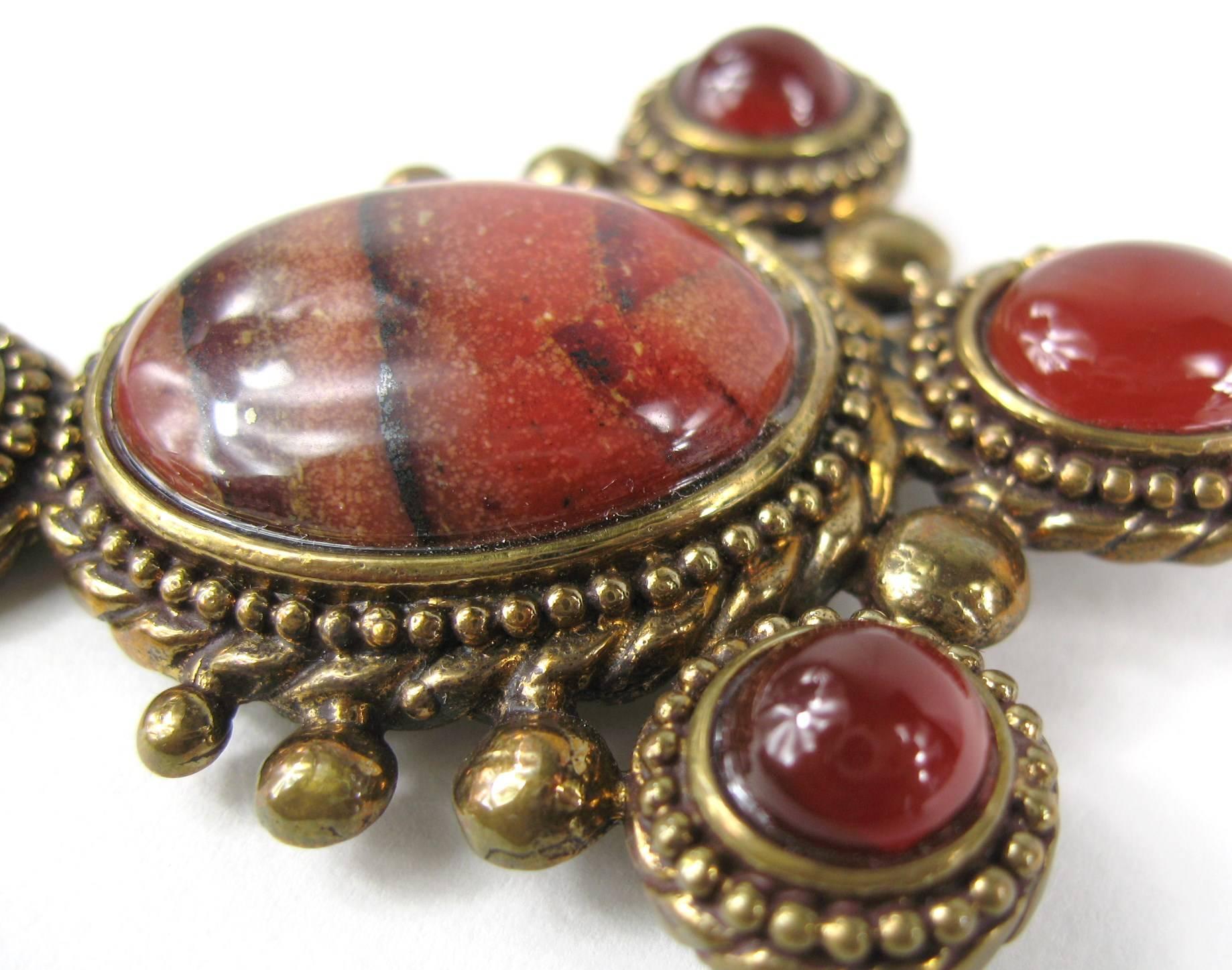 Breciated Jasper/ Carnelian Bronze Diva Pin as stated on the tag of this early Stephen Dweck Brooch - Measures 2.90 top to bottom x 1.90 wide. We have many more pieces from Dweck, all of which are from the late 1980s.  This is out of a massive