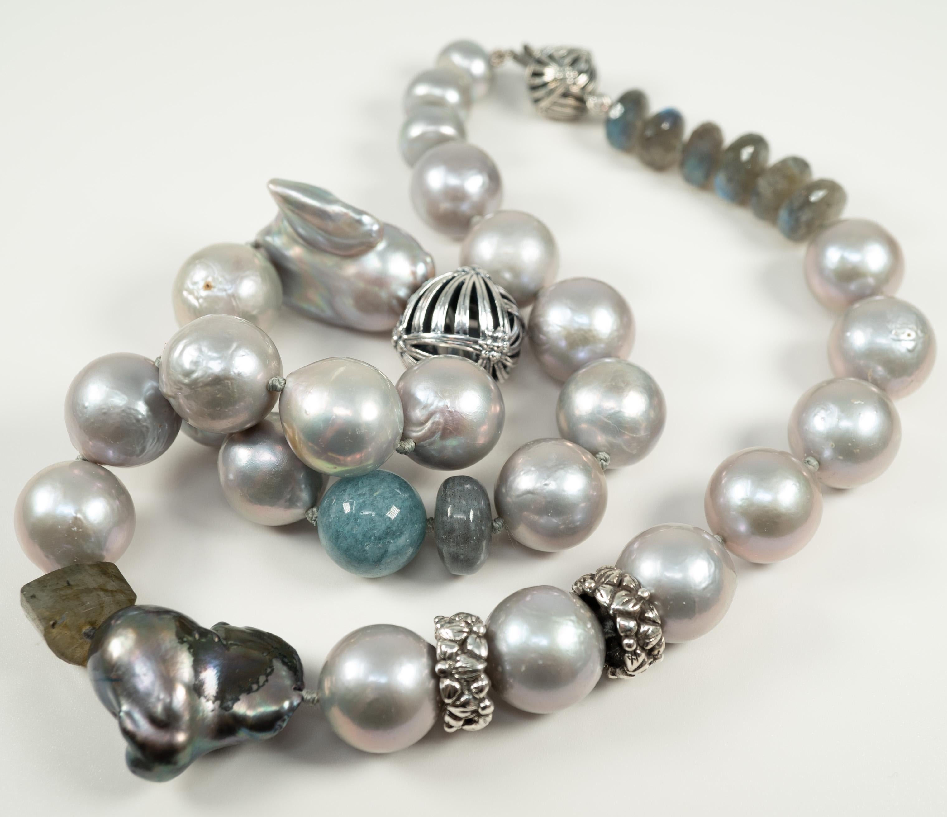 Mother Nature provided some fun shapes of pearls for this necklace by famed designer Stephen Dweck!  With accent sterling silver rondells and beads and carved quartz and labradorite.  