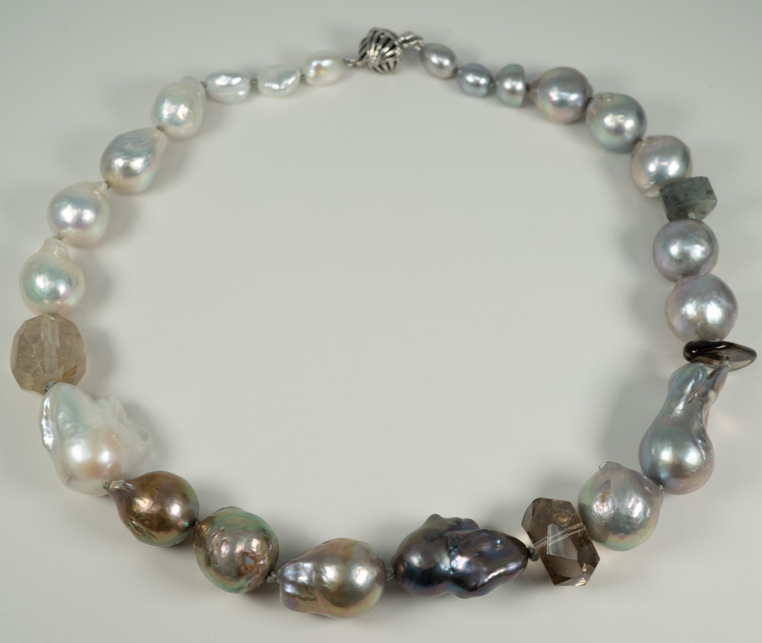More fun pearl shapes from Mother Nature!  Accented with faceted quartz stones!