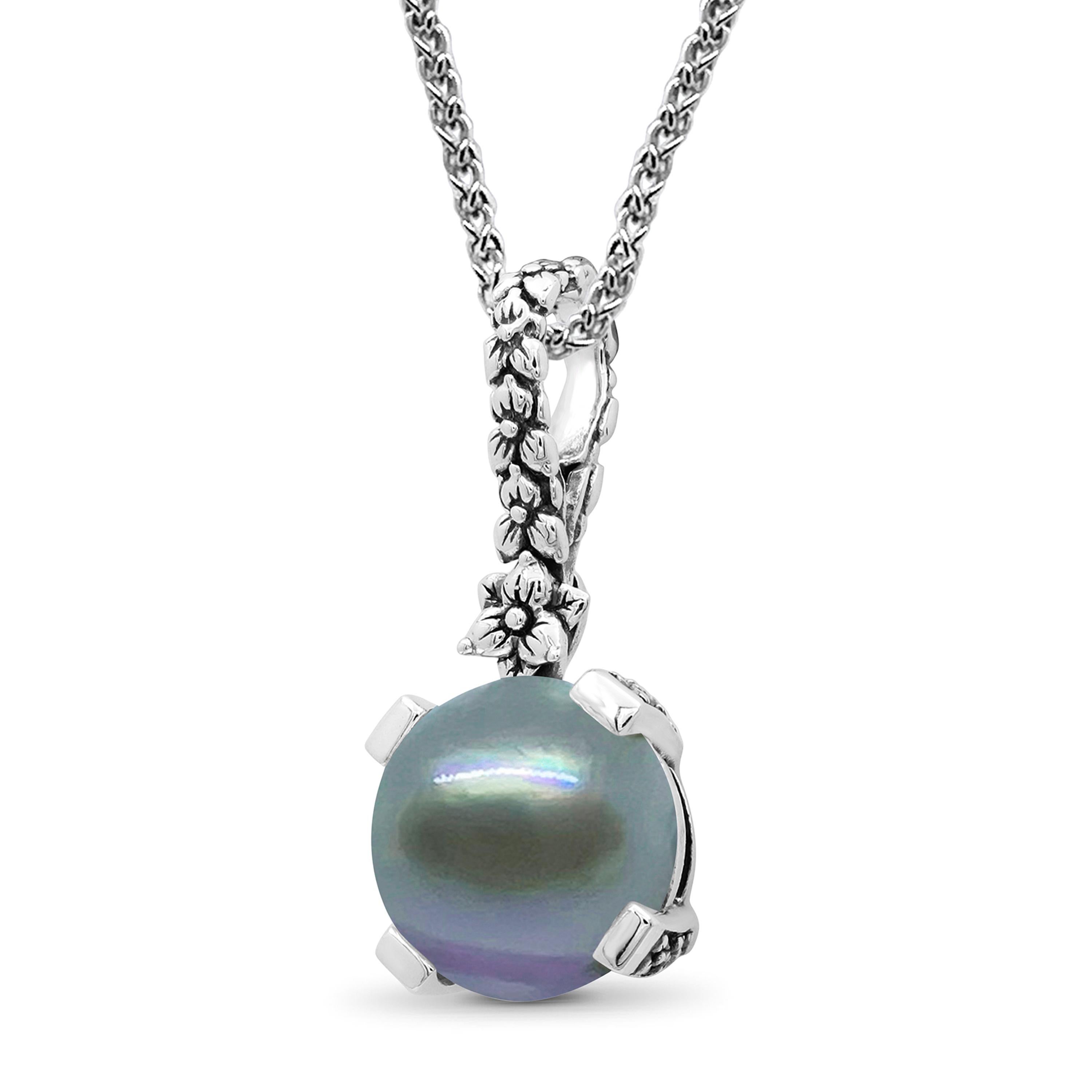 This finely detailed Stephen Dweck Sterling Silver Pendant Necklace features a 14mm sea blue pearl in a hand carved floral setting on a silver chain with a toggle clasp. The Decoration Size is 14mm. The Length is 18'' inches. The Weight is 14.2g.