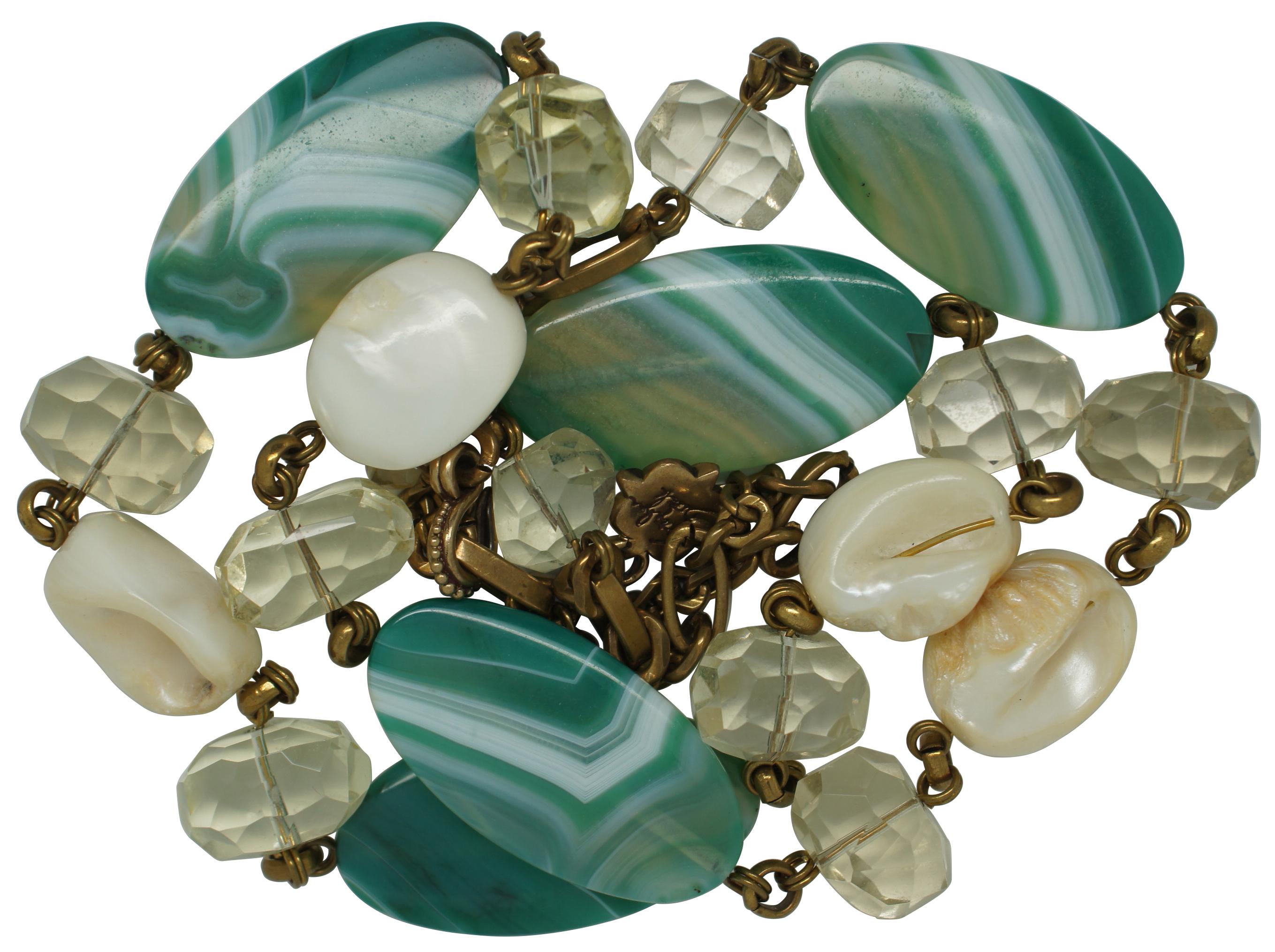 Stephen Dweck designer statement necklace featuring alternating faceted crystal beads, natural pearl shells and banded turquoise and white polished gemstones.
  