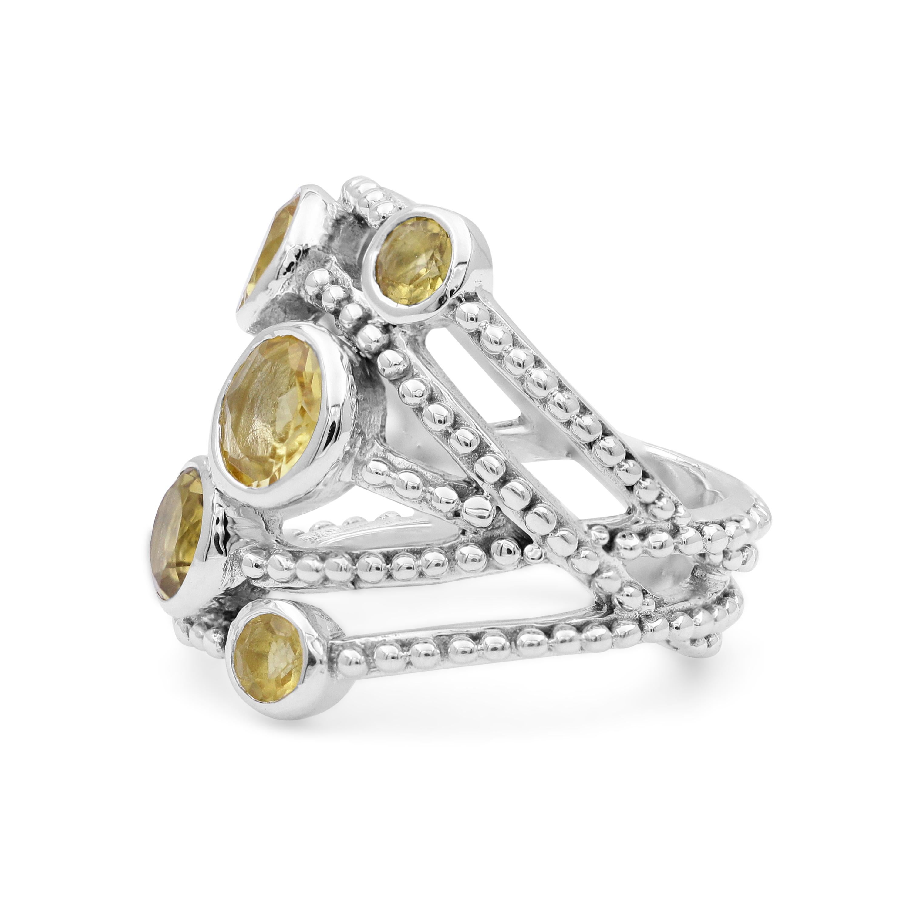 This bejeweled Stephen Dweck Sterling Silver Statement Ring features beaded rows of sterling silver flattered with vibrant bezel set Citrine (3mm-6mm). Drawing inspiration from a love of nature and passion for art, each Stephen Dweck creation is a