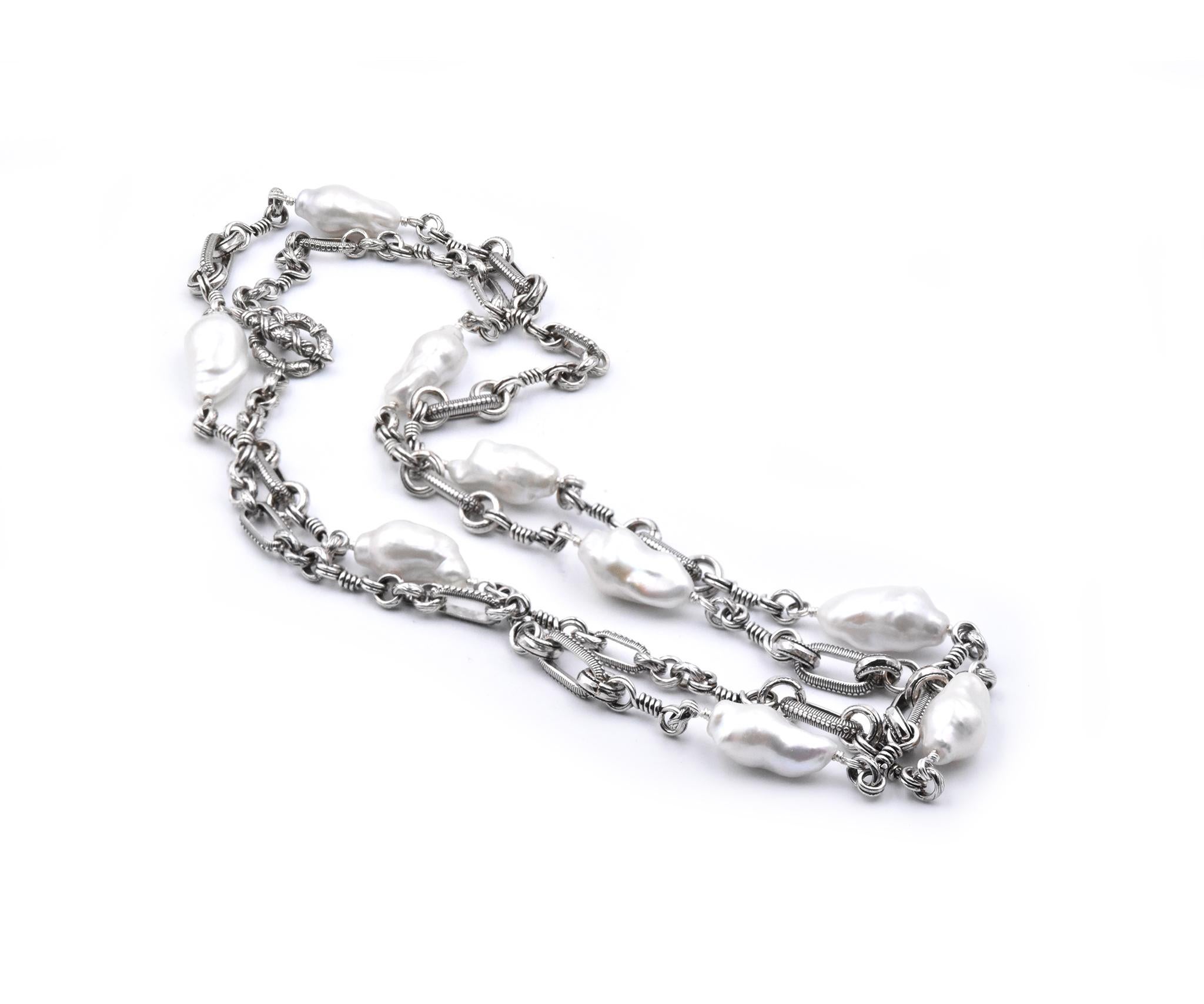 Designer: Stephen Dweck
Material: Sterling Silver
Pearls: 9 baroque pearls
Dimensions: necklace measures 44-inches in length
Weight: 113.4 grams
