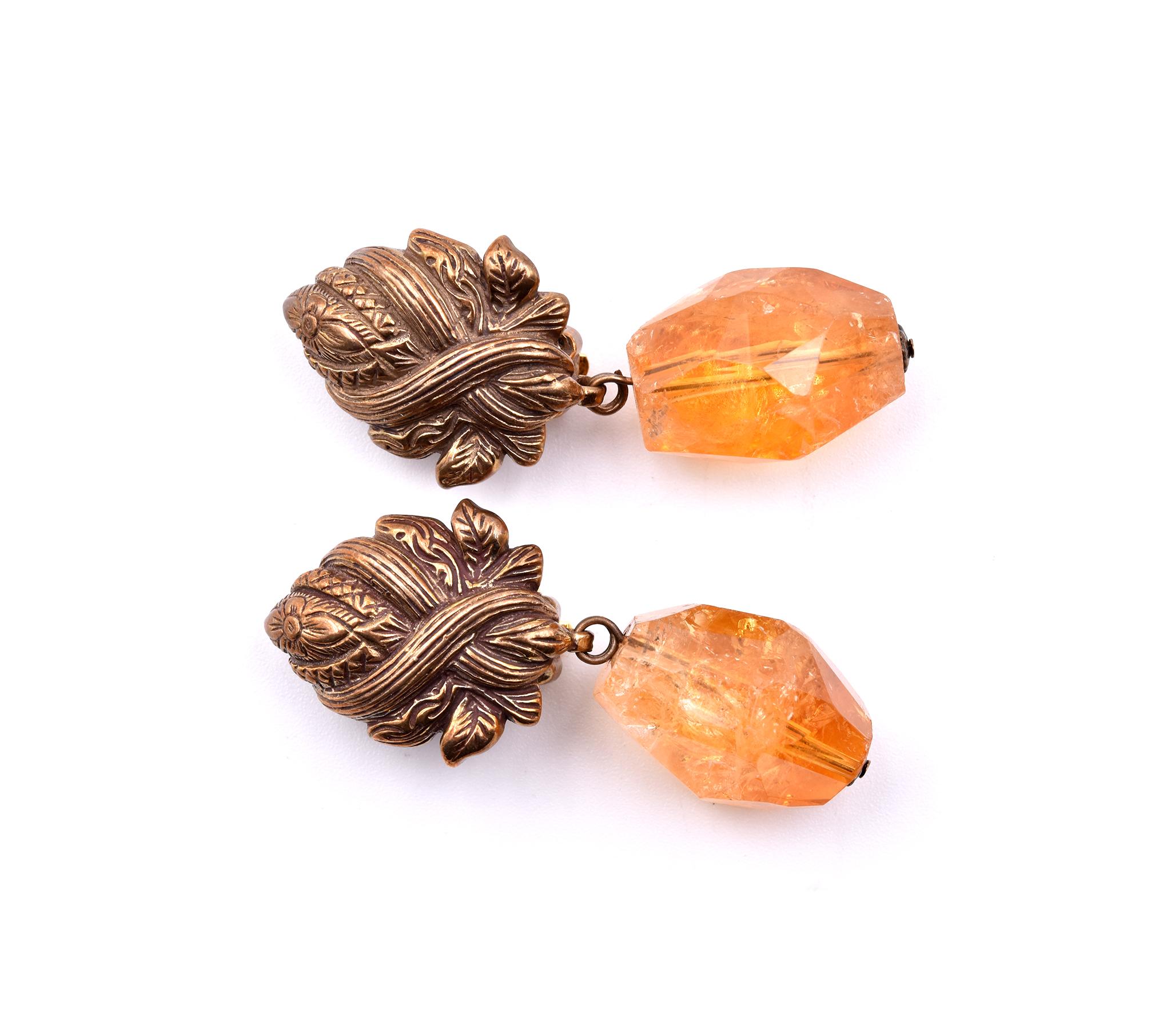 Designer: Stephen Dweck
Material: sterling silver
Gemstone: 2 faceted citrine nuggets
Dimensions: earrings measure 44.15mm x 18.35mm
Fastening: clip on
Weight: 18.22 grams
