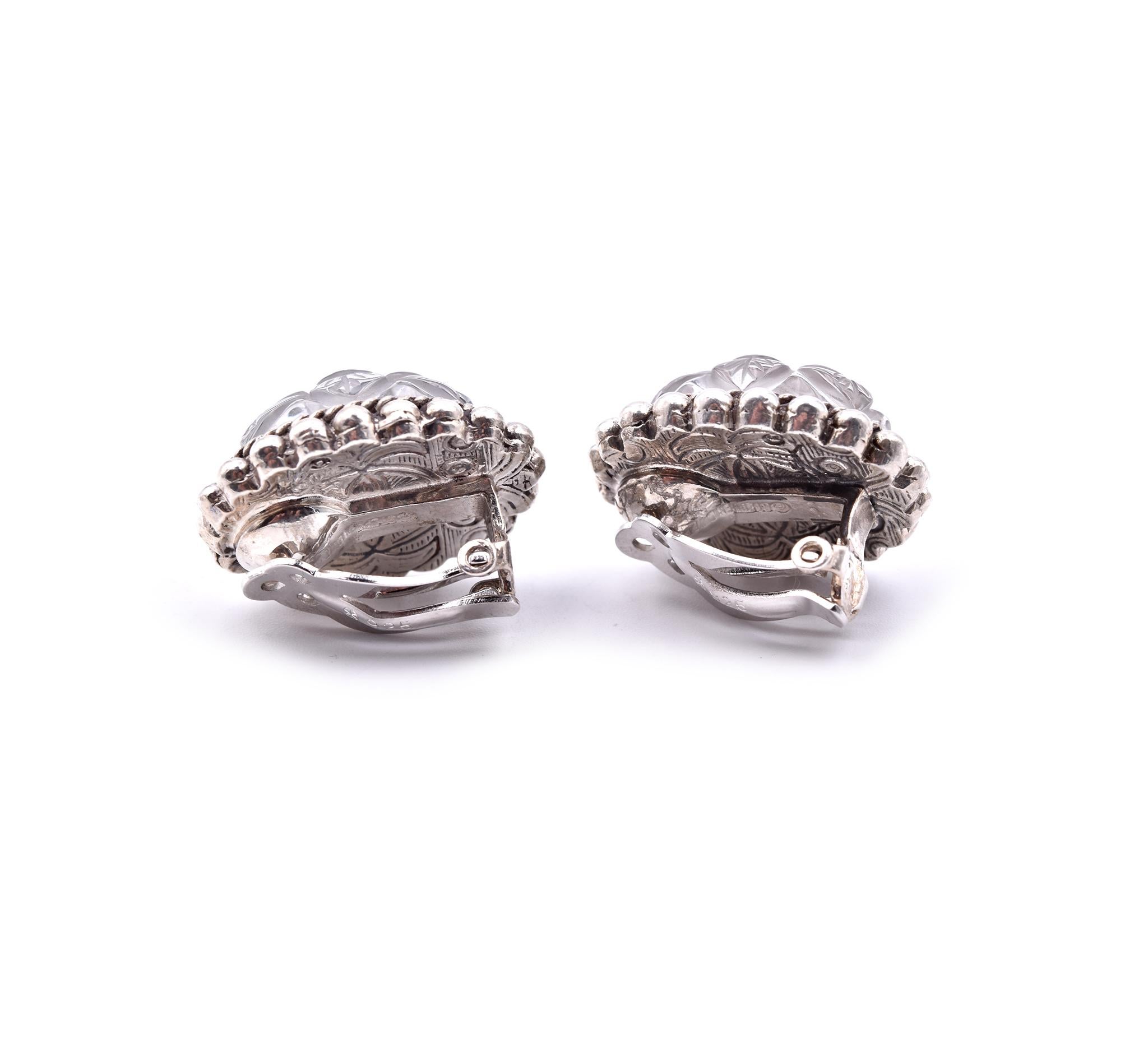 Designer: Stephen Dweck
Material: sterling silver
Dimensions: earrings measure 27.70mm x 23.05mm
Fastening: clip on
Weight: 33.68 grams
