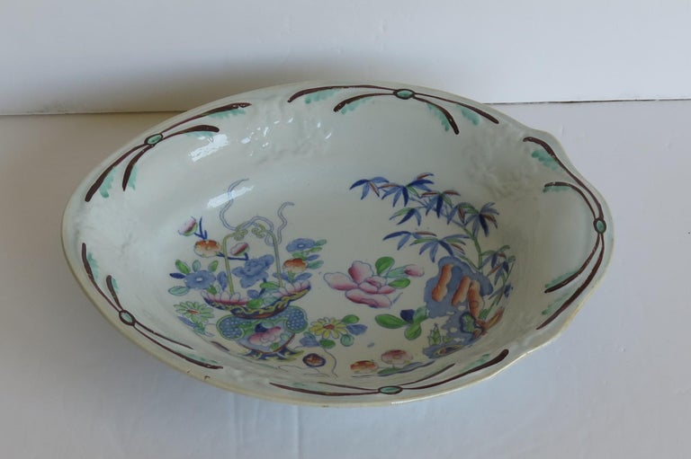 This is a rare early 19th century ironstone desert plate made by Stephen Folch of Church street, Stoke, Staffordshire Potteries, England between 1819 and 1829.

The plate or Dish/bowl is well potted with an oval shape and moulded pattern to the