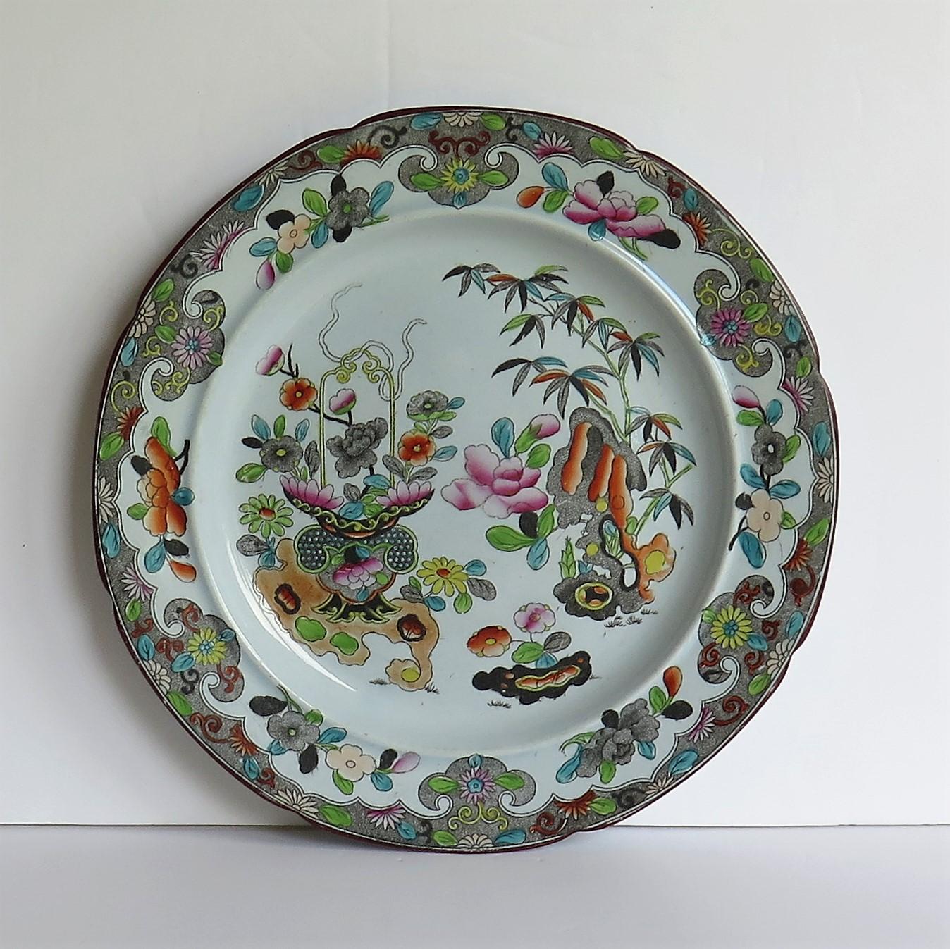 This is a rare early 19th Century Ironstone Dinner Plate made by Stephen Folch of Church Street, Stoke, Staffordshire Potteries, England between 1819 and 1829.

The plate has a light grey-blue glaze and has been beautifully and carefully