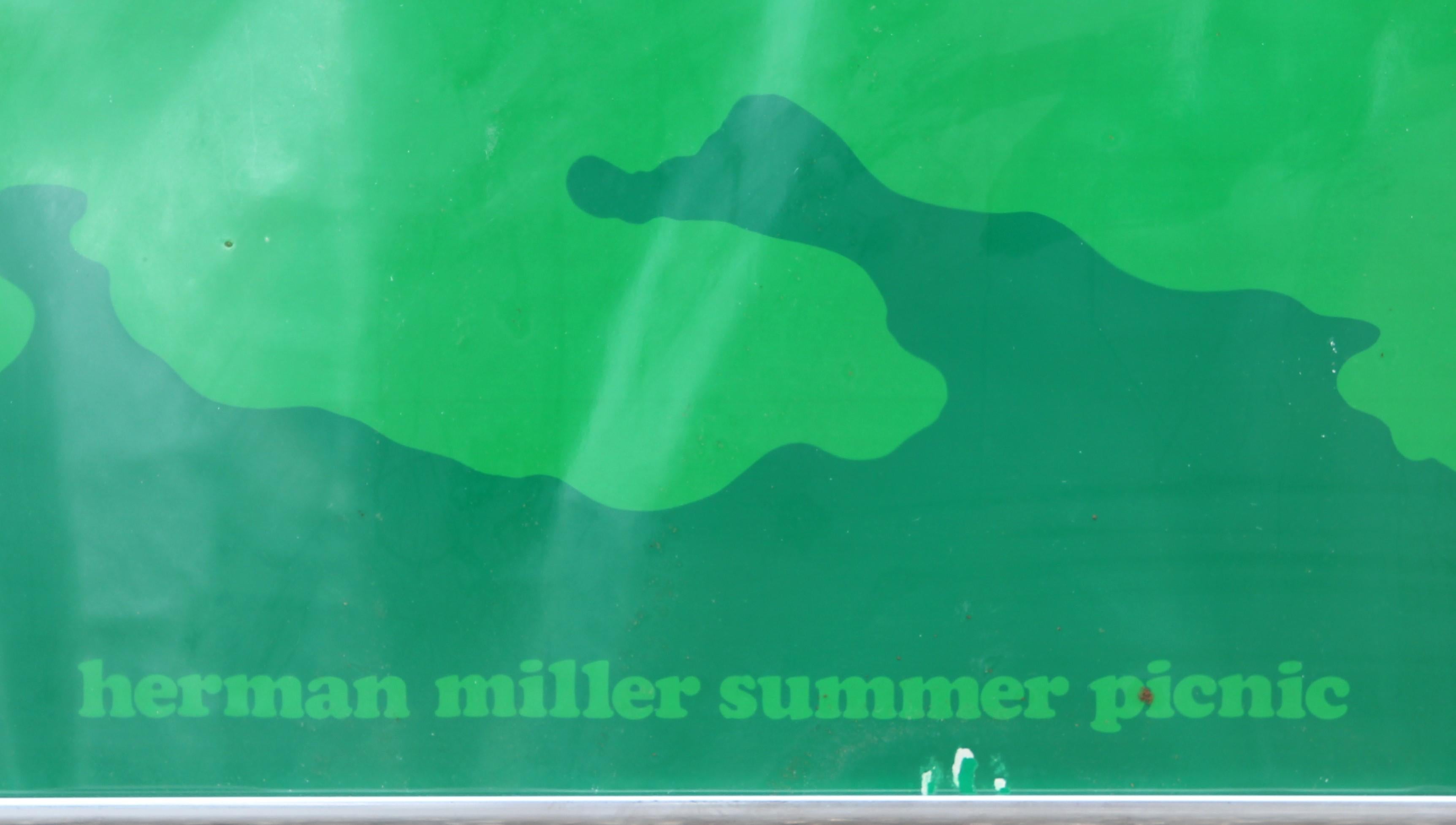 Original Herman Miller Summer Picnic screen printed lacquer ink and lacquer finish print. August 5, 1977 annual company picnic poster is a close up graphic vector of a fruit salad in vibrant greens, yellows, and indigos. Framed in silver metal