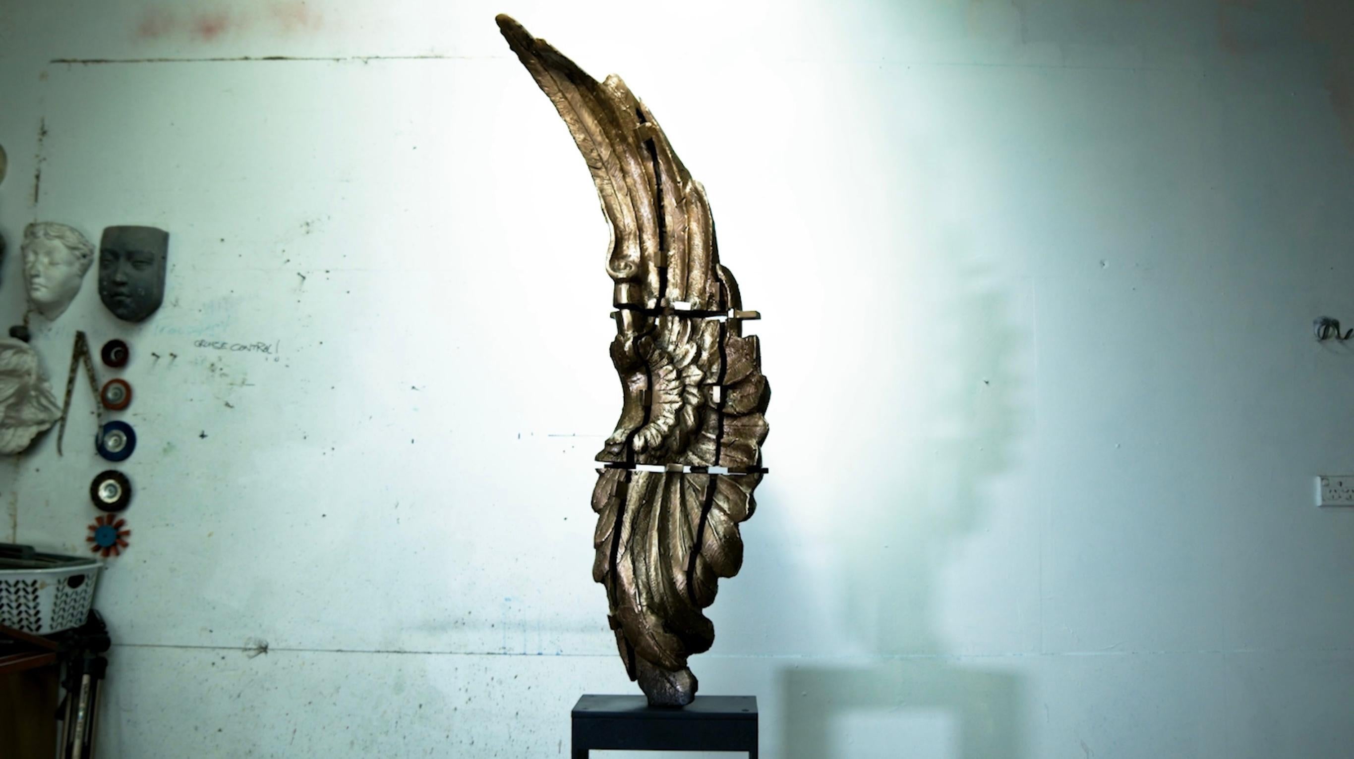 Split Wing, Contemporary Bronze Sculpture on Steel base - Gold Figurative Sculpture by Stephen Glassborow