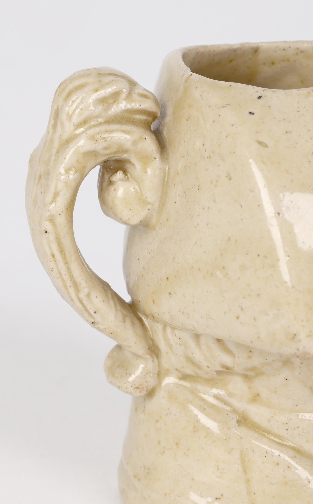 Début de l'époque victorienne Stephen Green Lambeth Pichet miniature Napoléon en grès émaillé au sel et à la crème en vente
