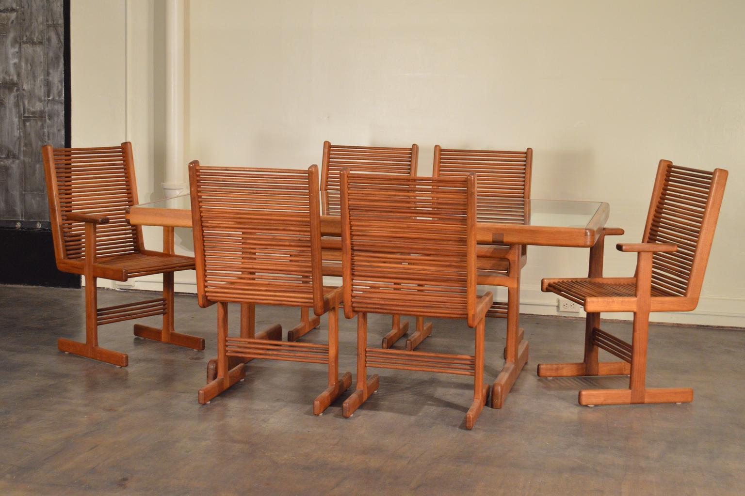 Hawaiian woodworker Stephen Hynson designed these chairs, custom made and branded 